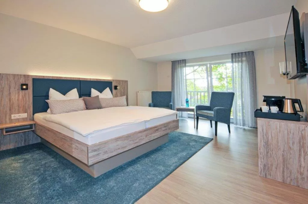 Coffee/tea facilities, Bed in Hotel Grasberger Hof GmbH