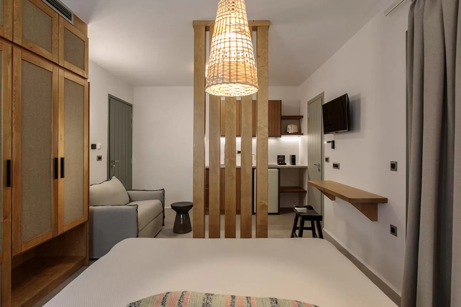 Bed in "Makava Suites" Your Luxe Urban Sanctuary