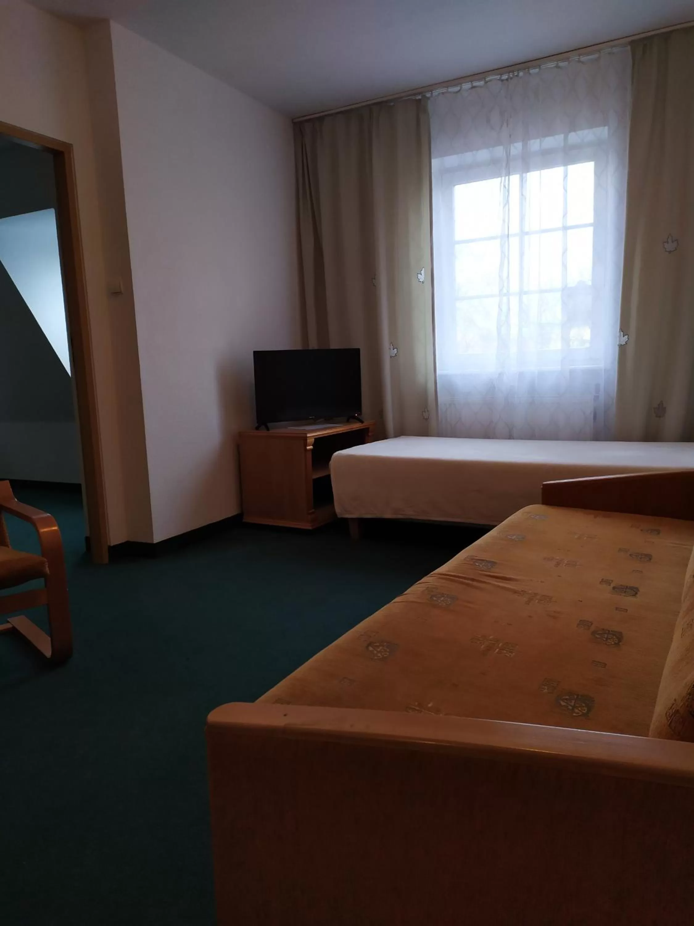 Communal lounge/ TV room, TV/Entertainment Center in Dom Turysty