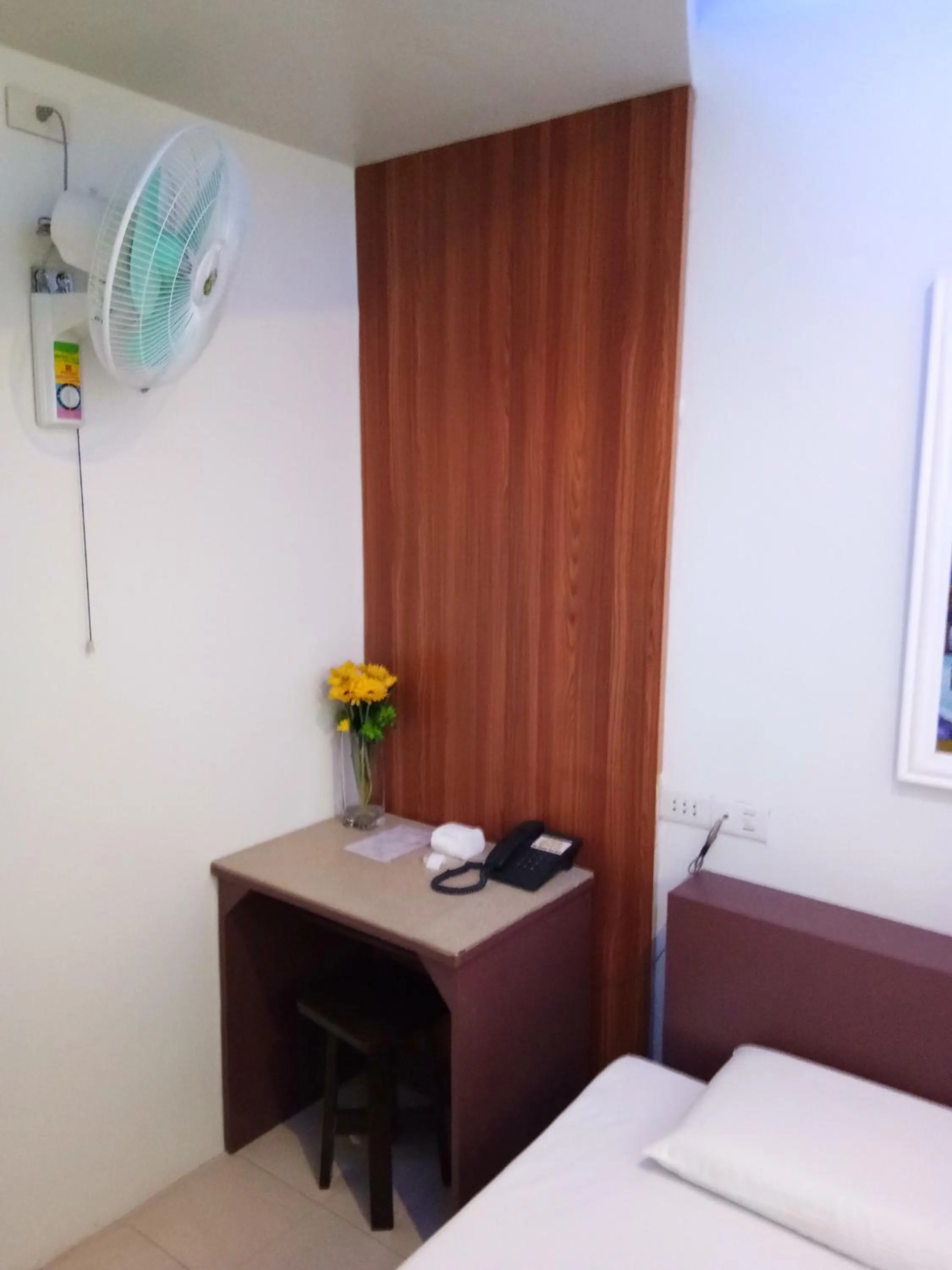 Bed in Anthurium Inn