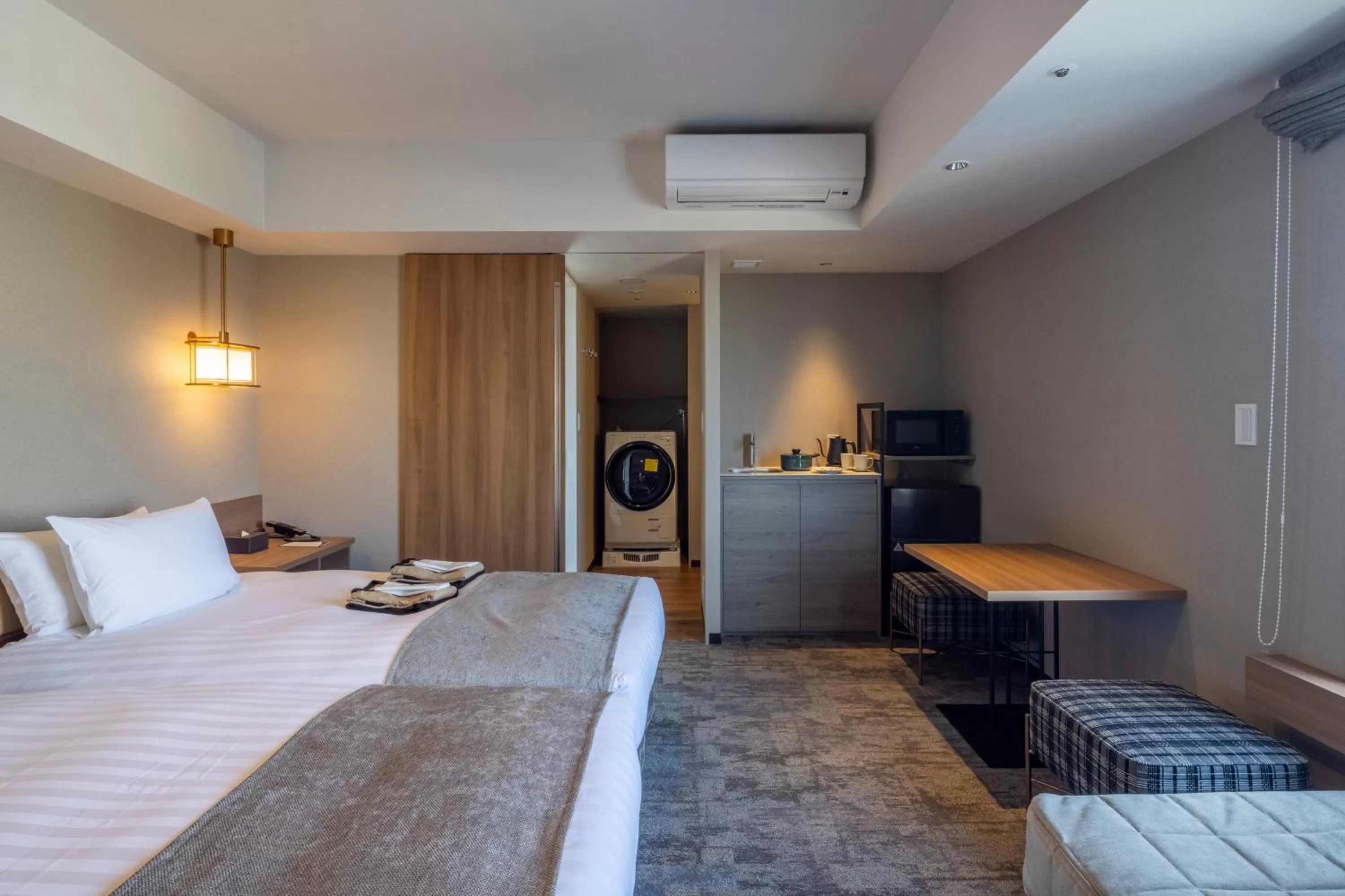 Bed in Tokyu Stay Hakodate Asaichi Akarinoyu