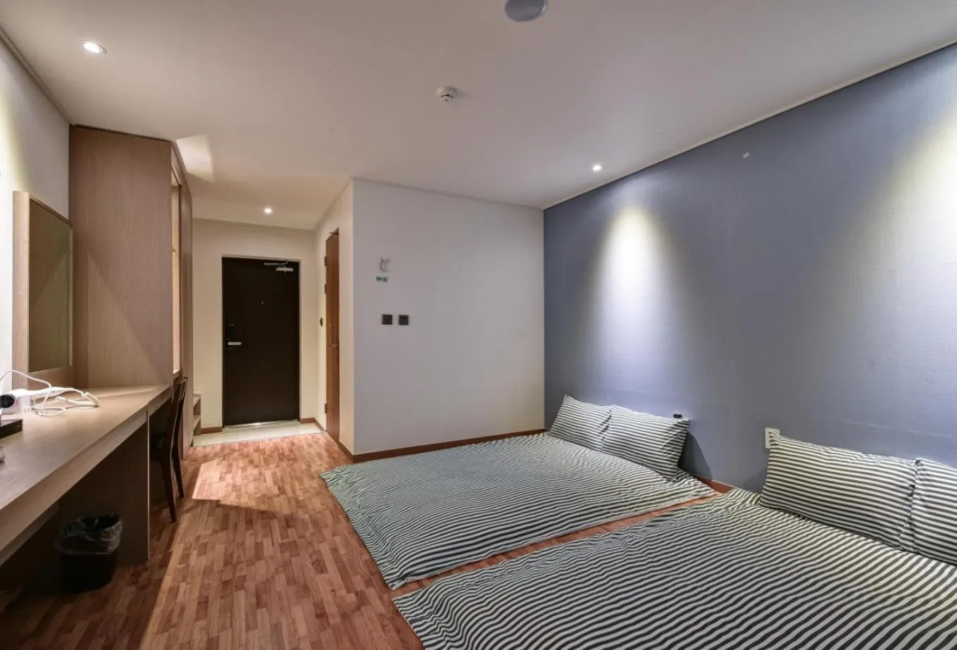 Photo of the whole room, Bed in Sea Moon Tourist Hotel