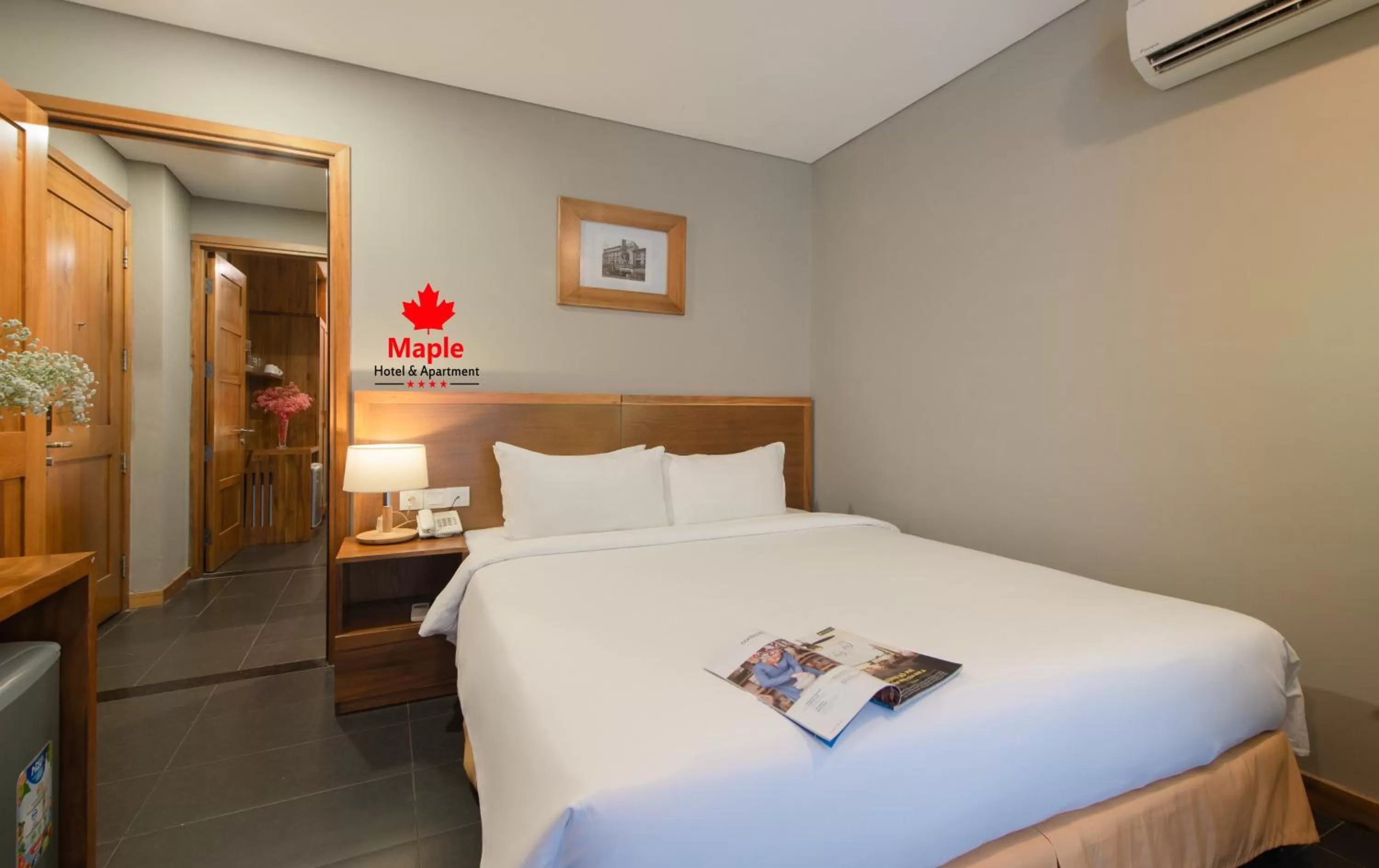 Bed in Maple Hotel & Apartment