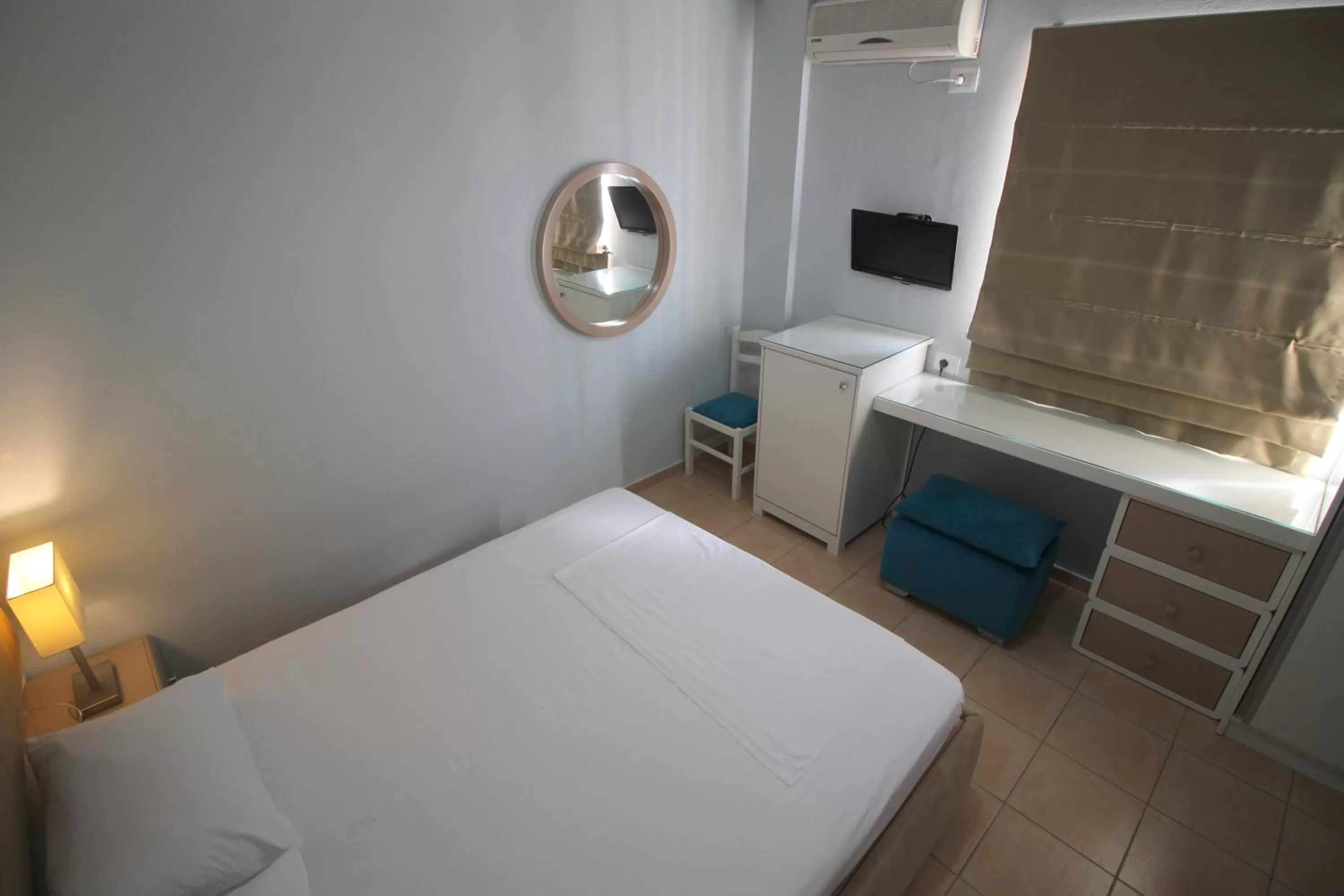 Bed in Murati Suites Sarandë
