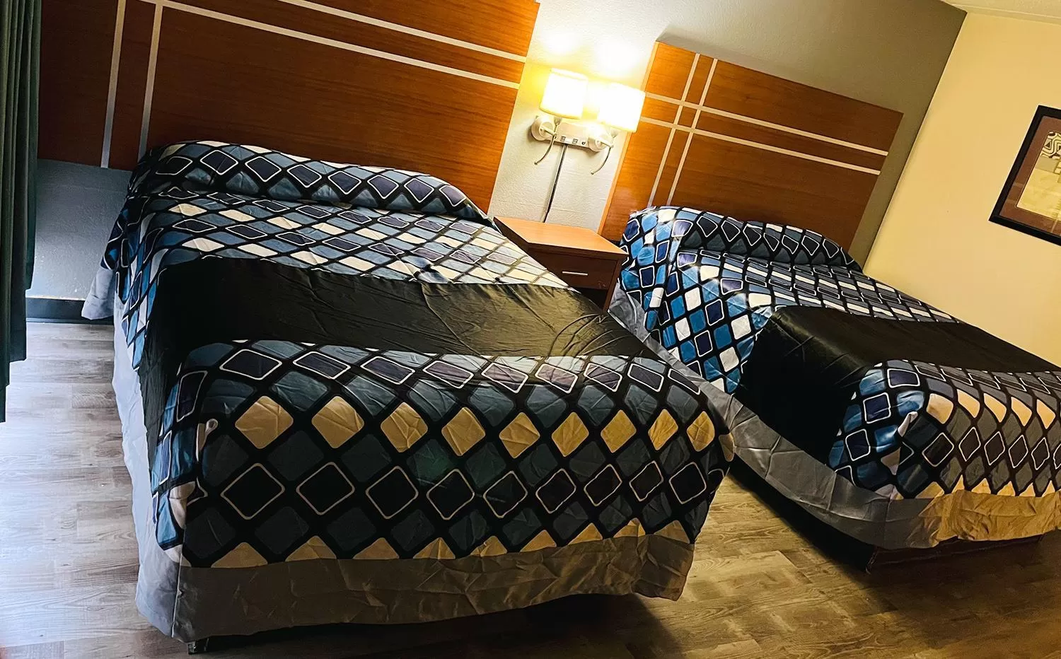 Bed in Coratel Inn & Suites by Jasper Waite Park