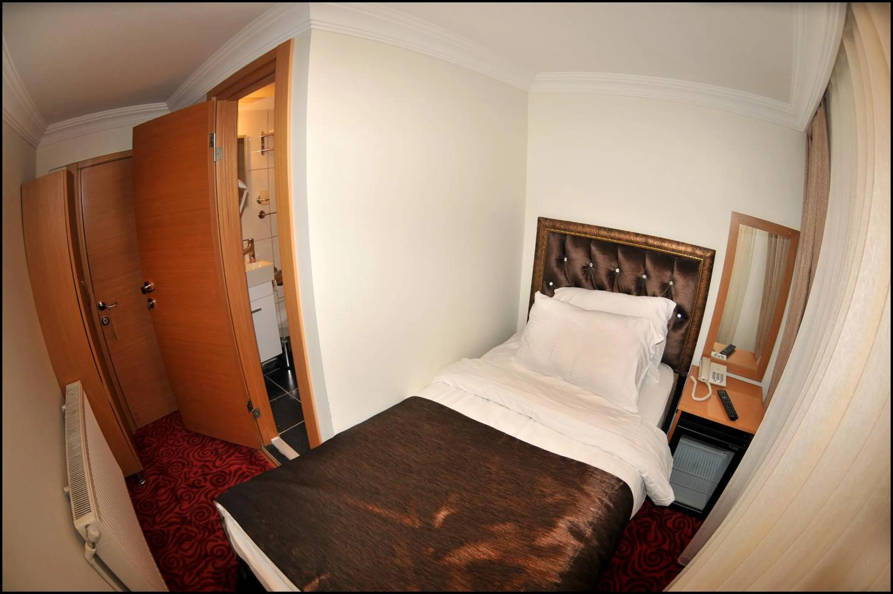 Bed in Palace Point Hotel