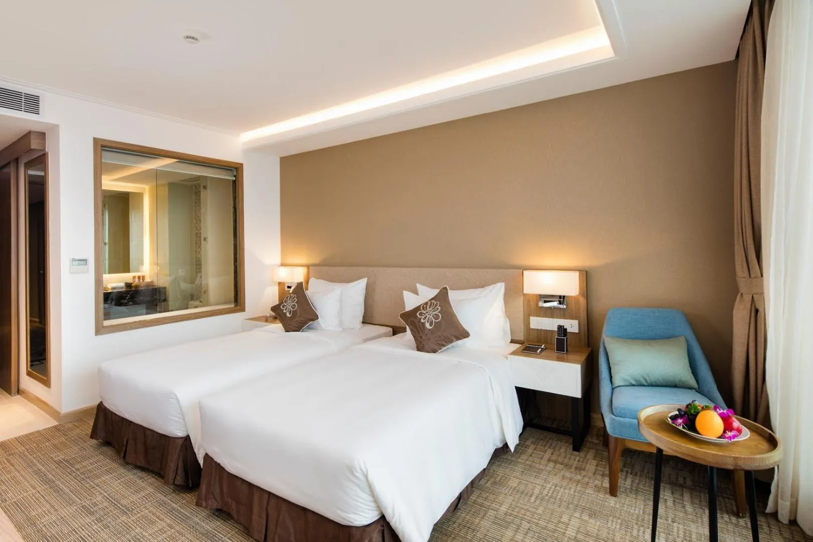 Photo of the whole room, Bed in Comodo Nha Trang Hotel