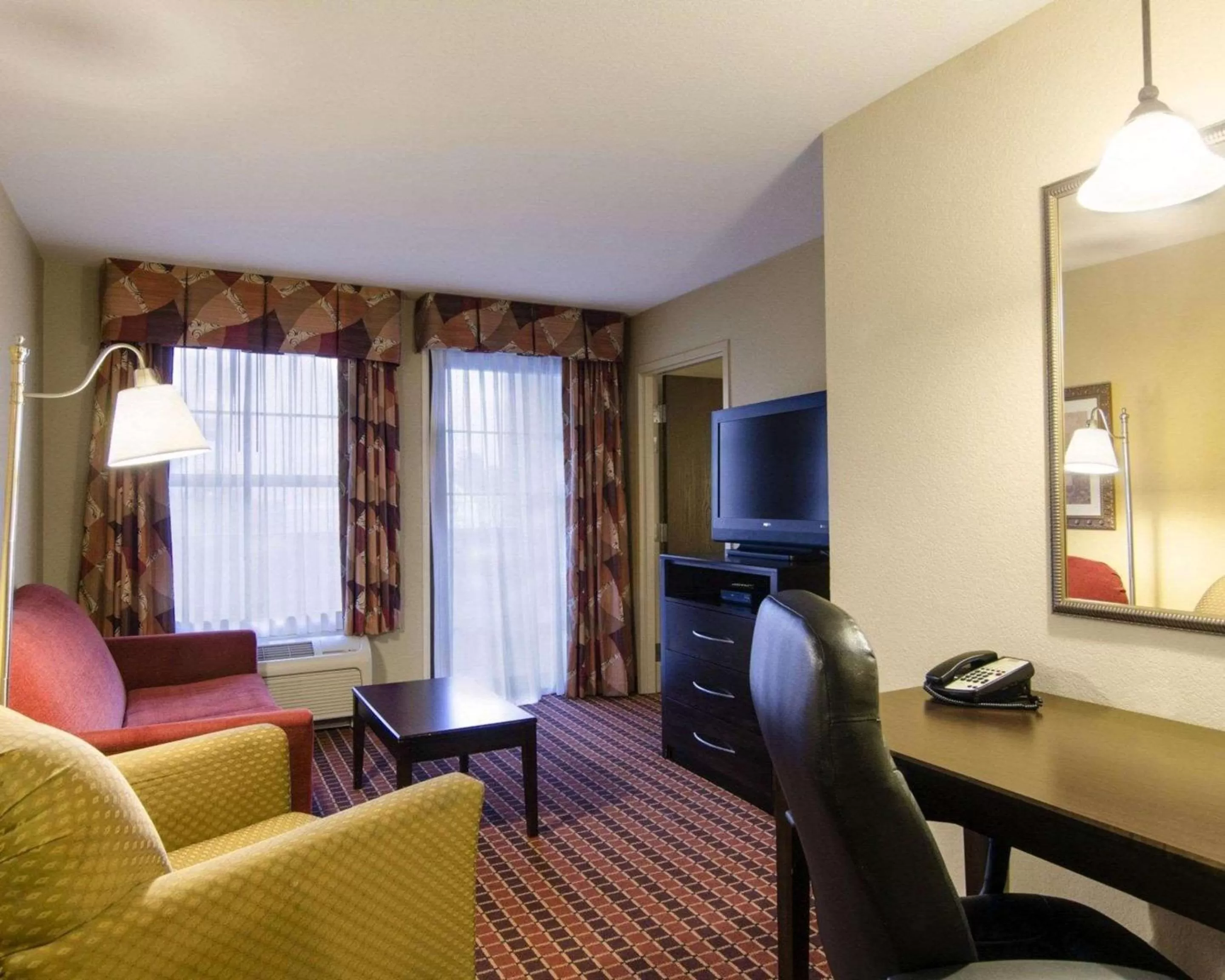 Photo of the whole room in Affordable Suites of America Rogers - Bentonville