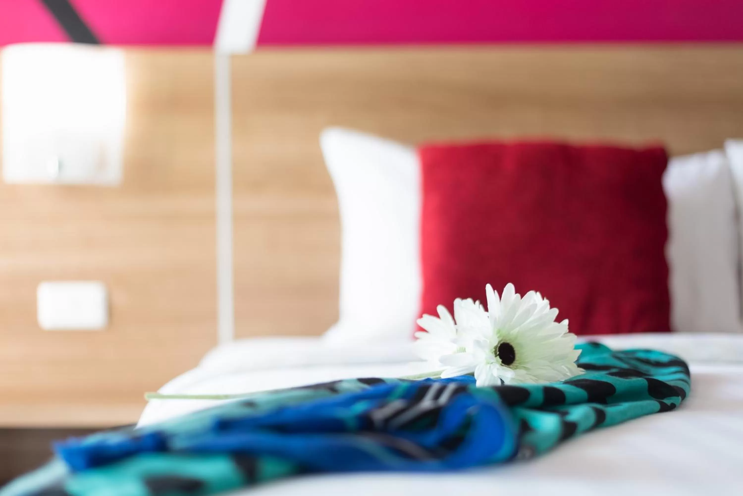 Bed in Eco Inn Lite Chanthaburi