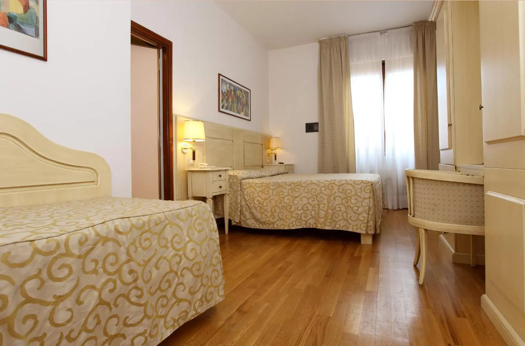 Triple Room in Grand Hotel Duomo Triple Room in Grand Hotel Duomo