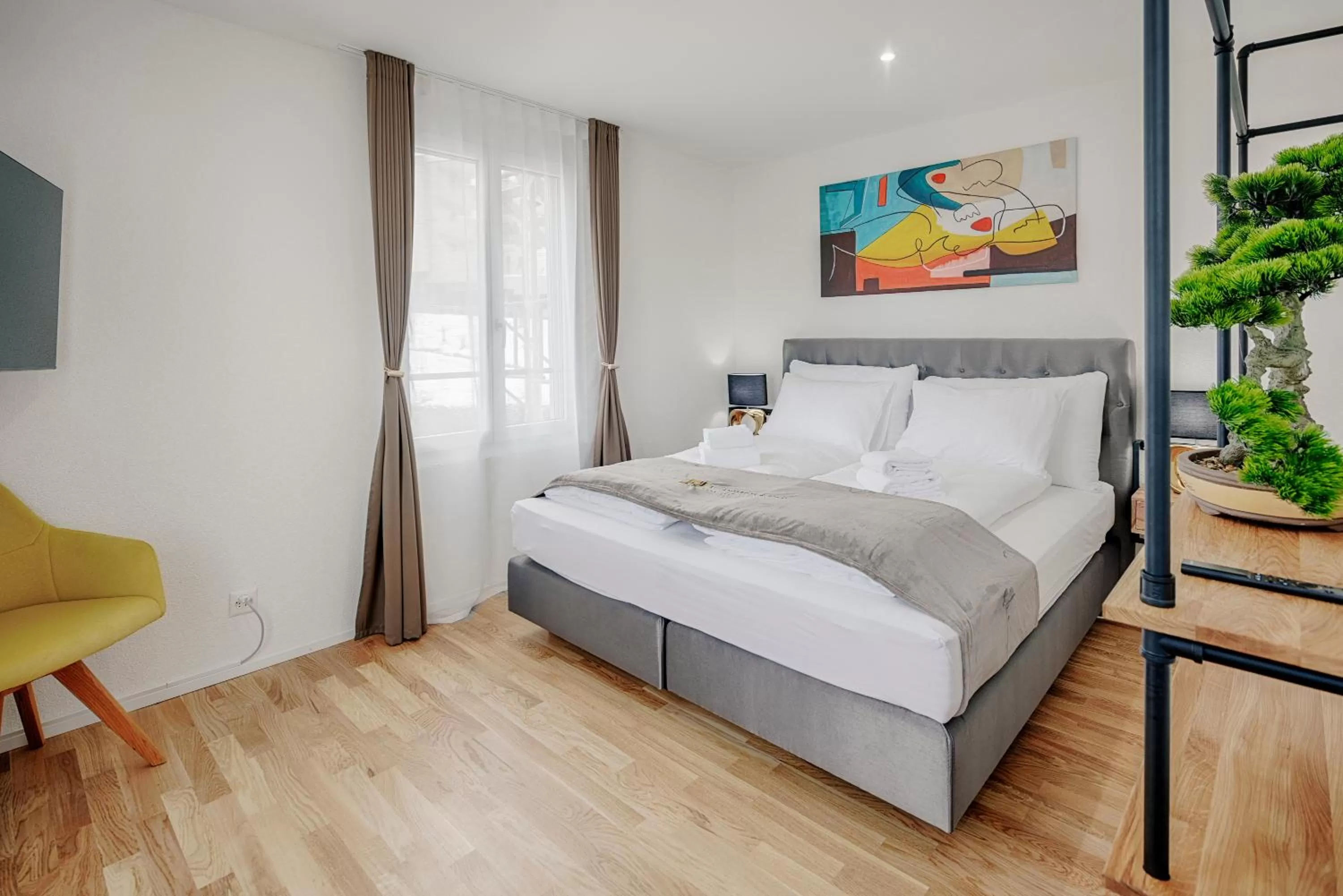 Bed in VISIMO Apartments St Georgen-Strasse St Gallen - Design City Nature