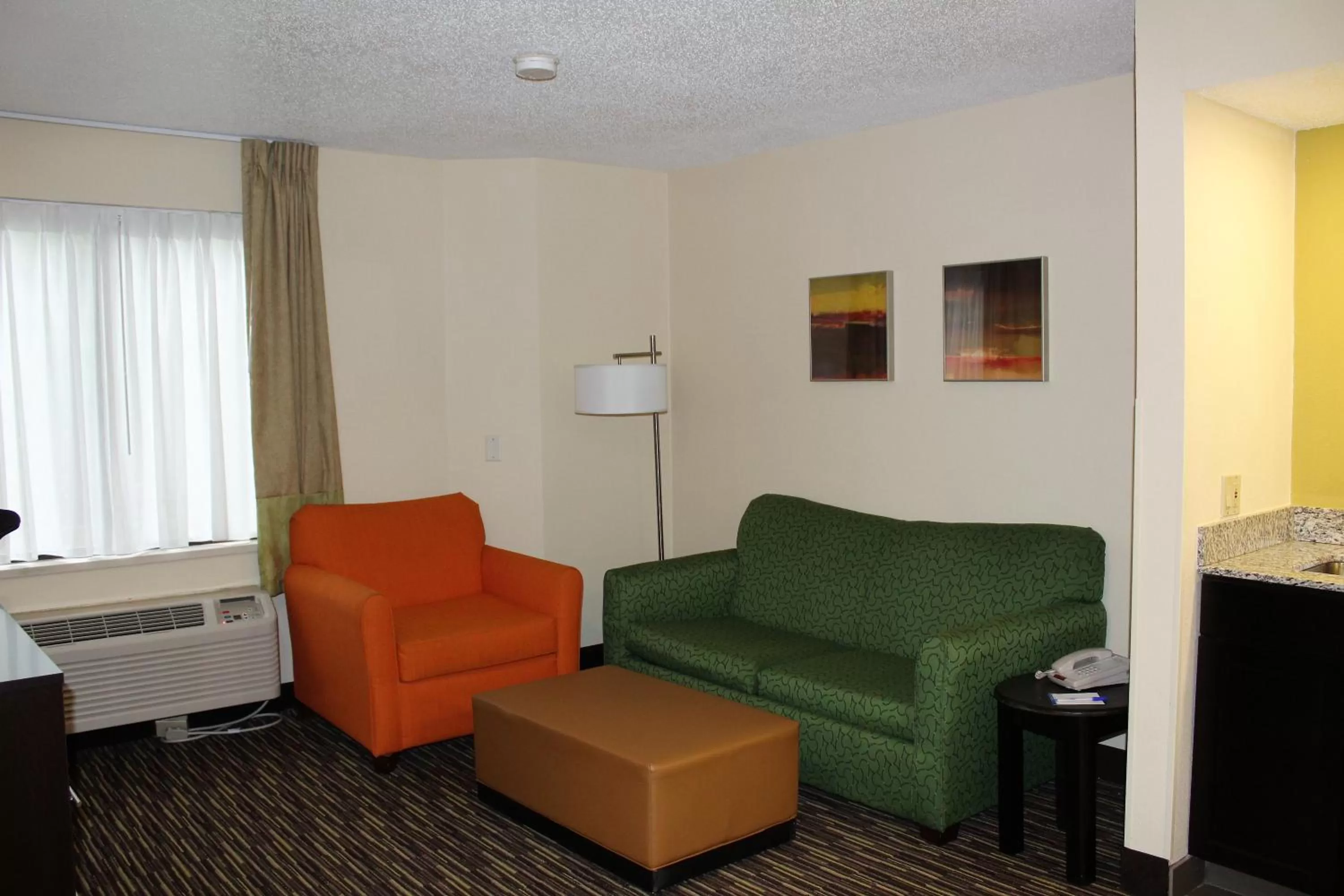 Living room in Baymont by Wyndham Newark at University of Delaware