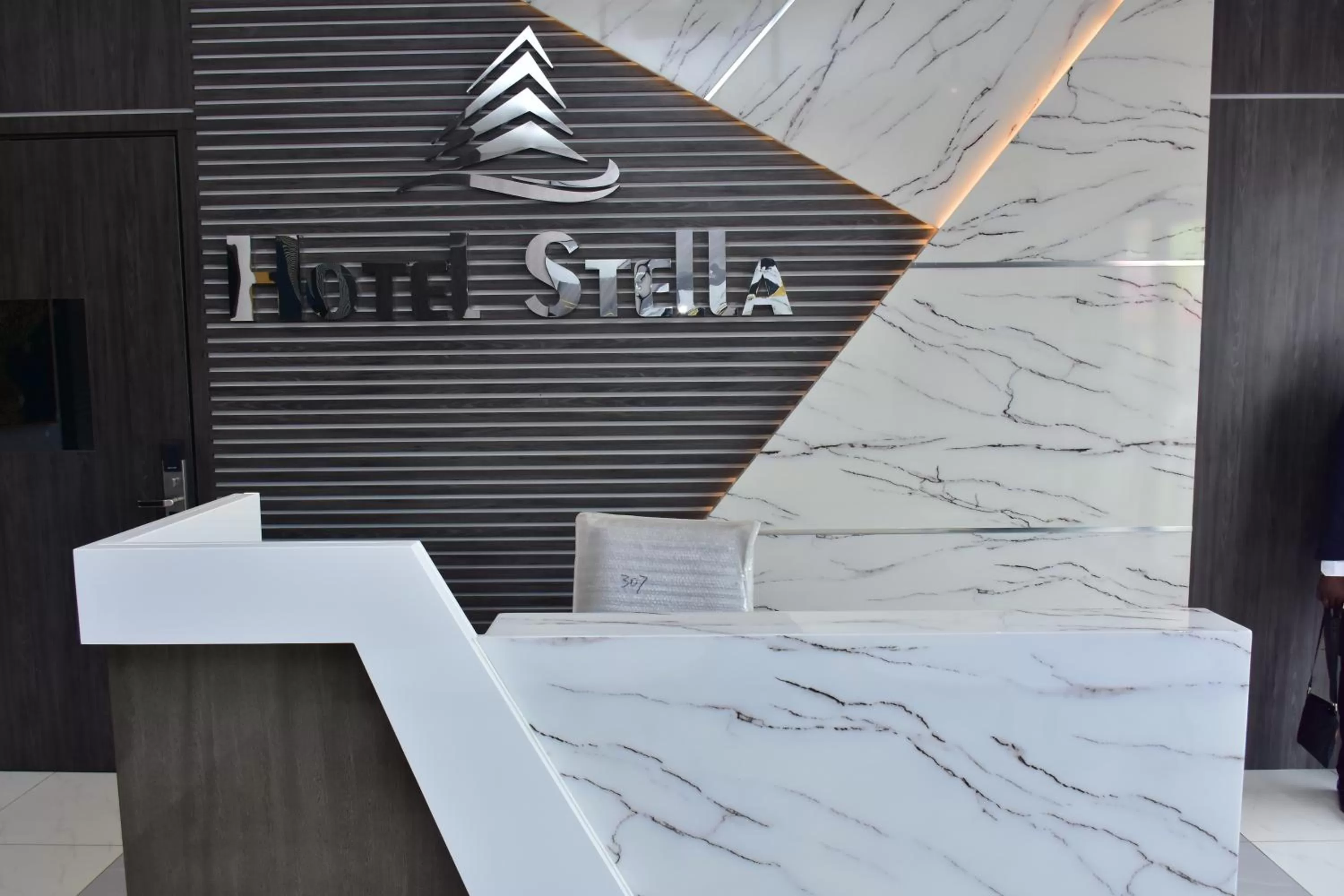 Property logo or sign in Hotel Stella