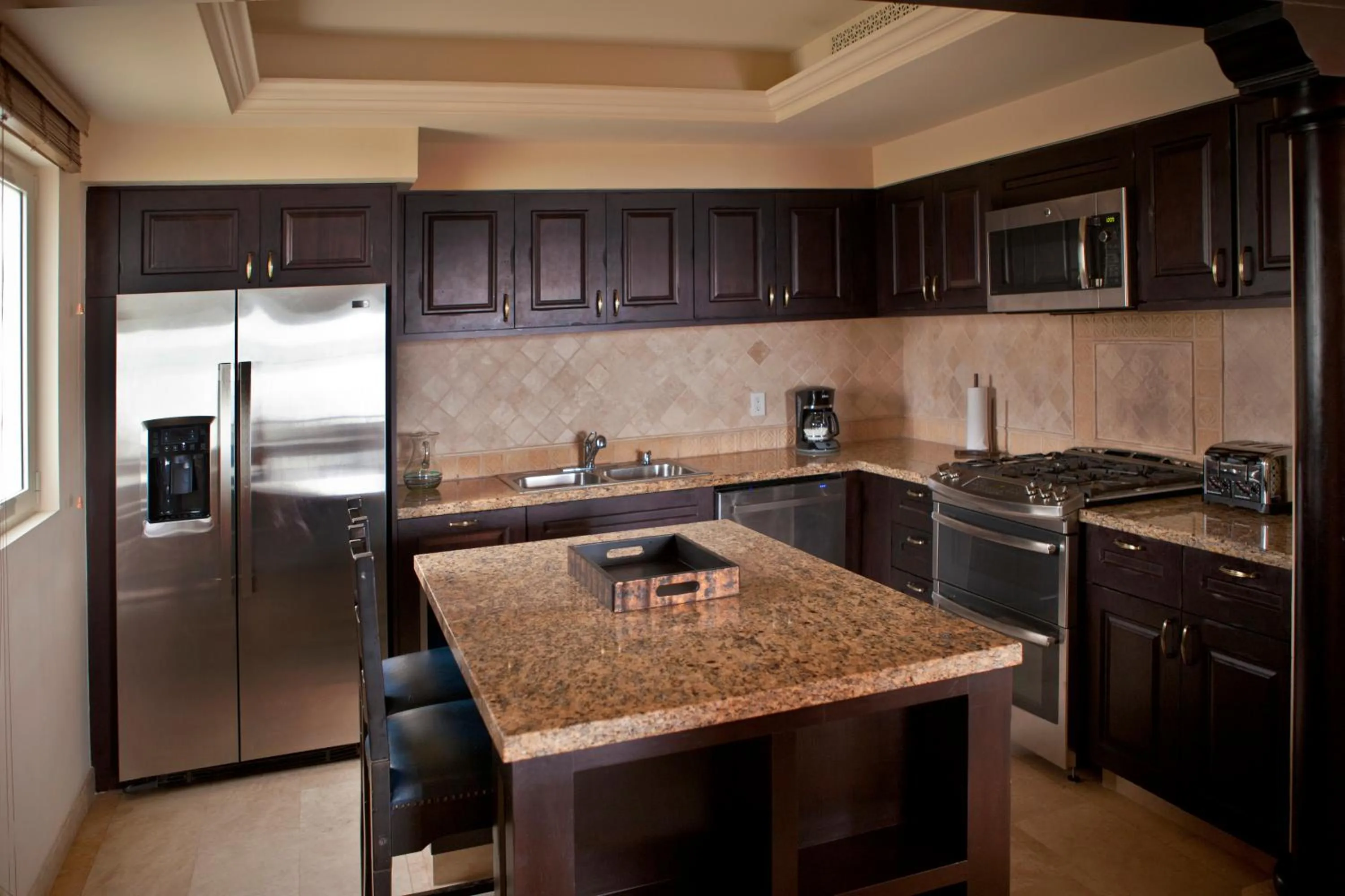 Kitchen or kitchenette in Montecristo Villas at Quivira Los Cabos -Vacation Rentals