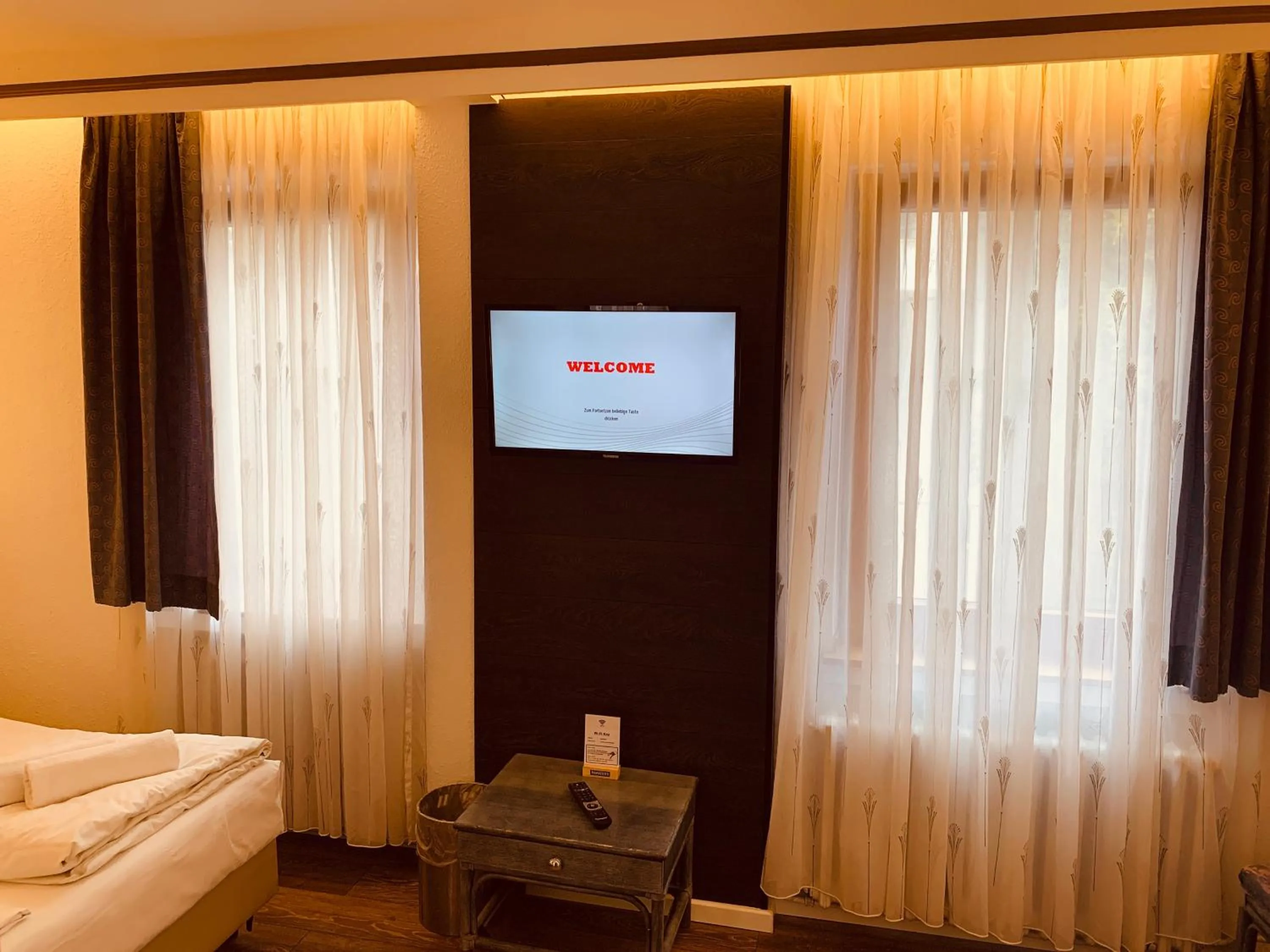 TV and multimedia, Bed in Hotel Kunibert der Fiese - Superior