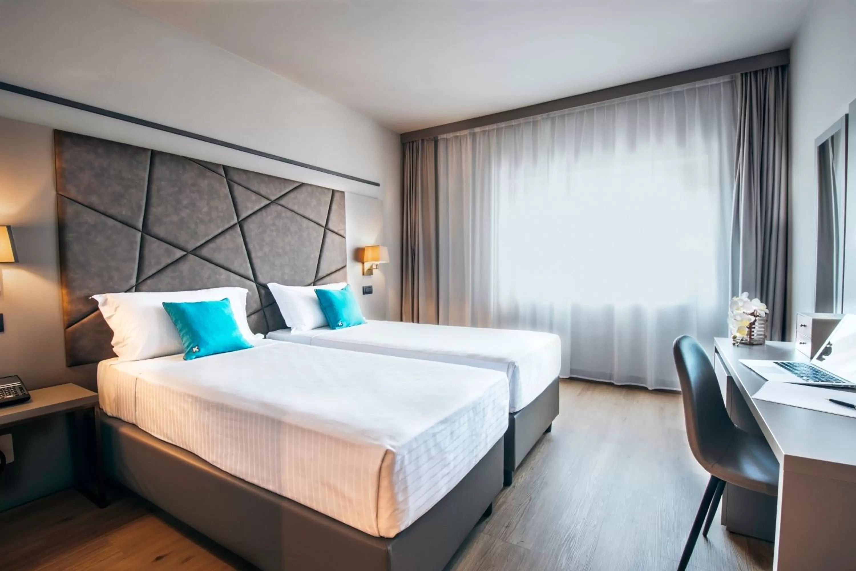 Bed in DC HOTEL INTERNATIONAL