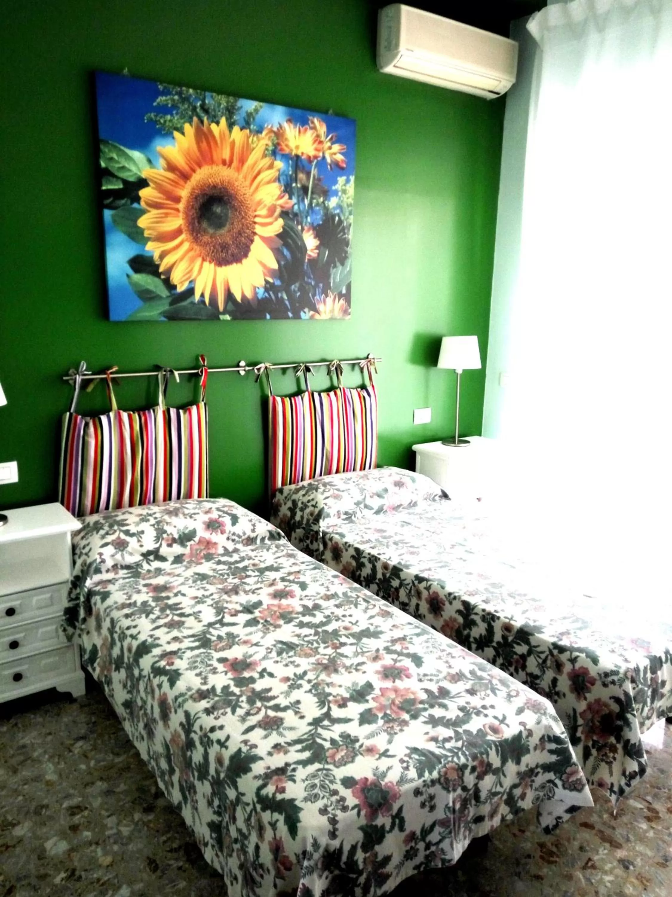 Bed in Michelangelo Rooms