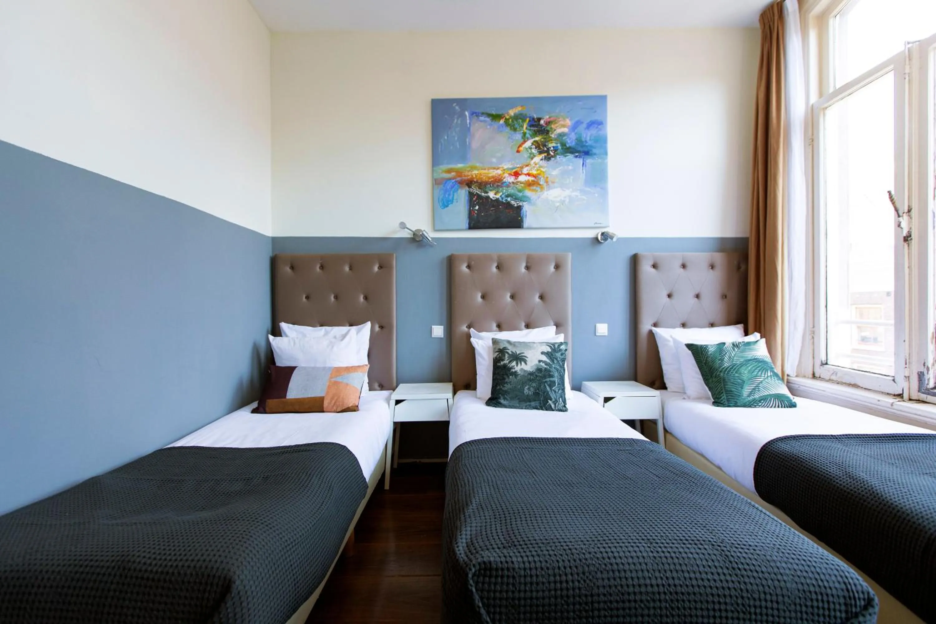 Bed in Quentin Arrive Hotel