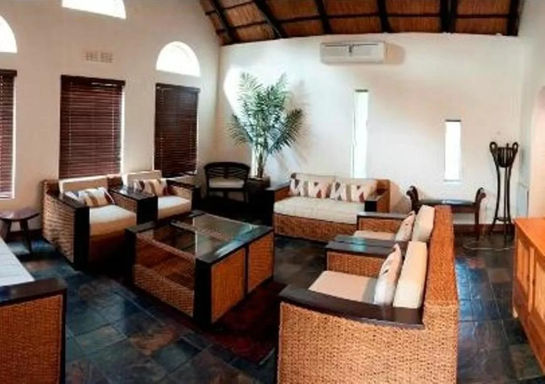Communal lounge/ TV room in Rustenburg Boutique Hotel