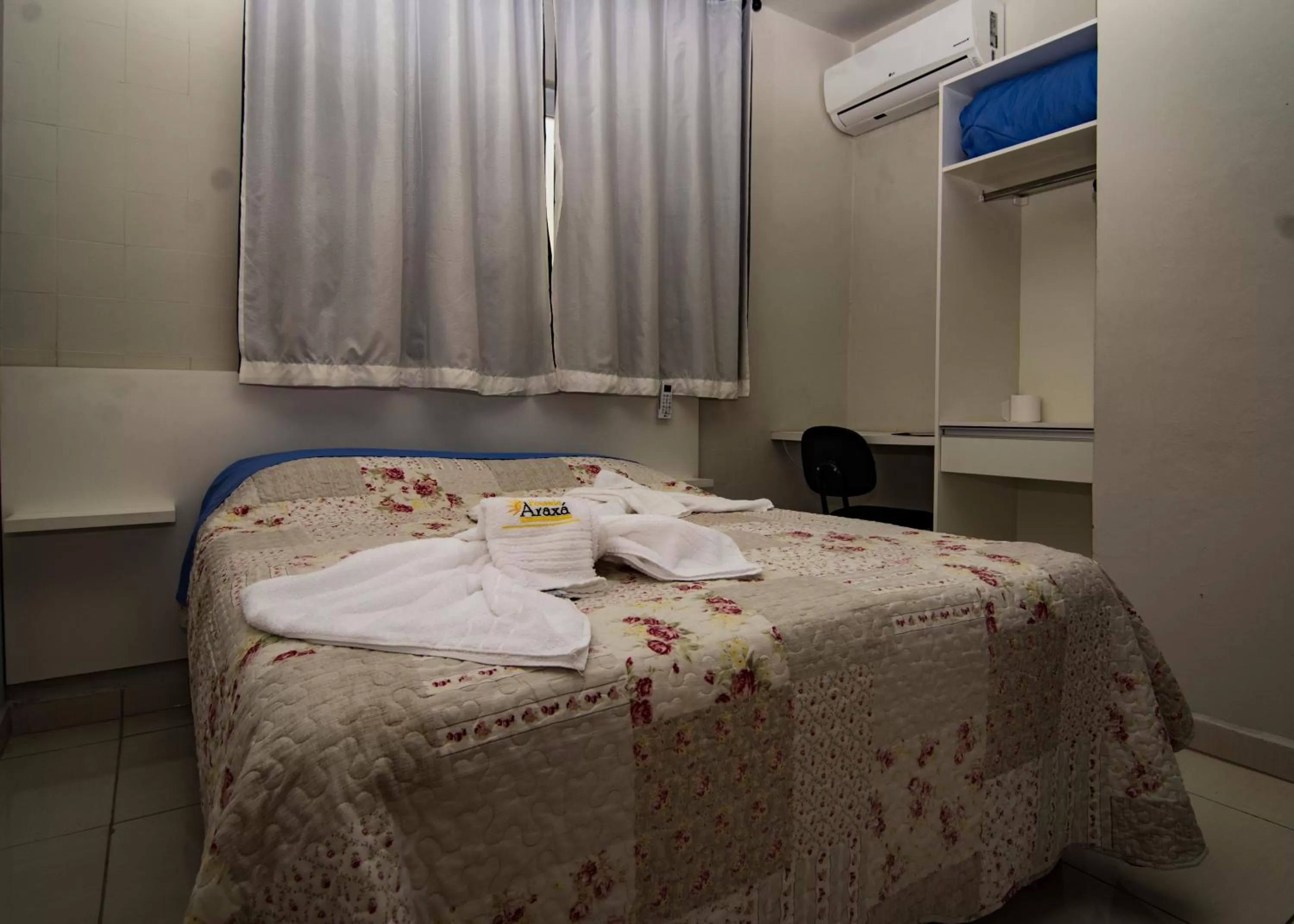 Bed in Pousada Araxá