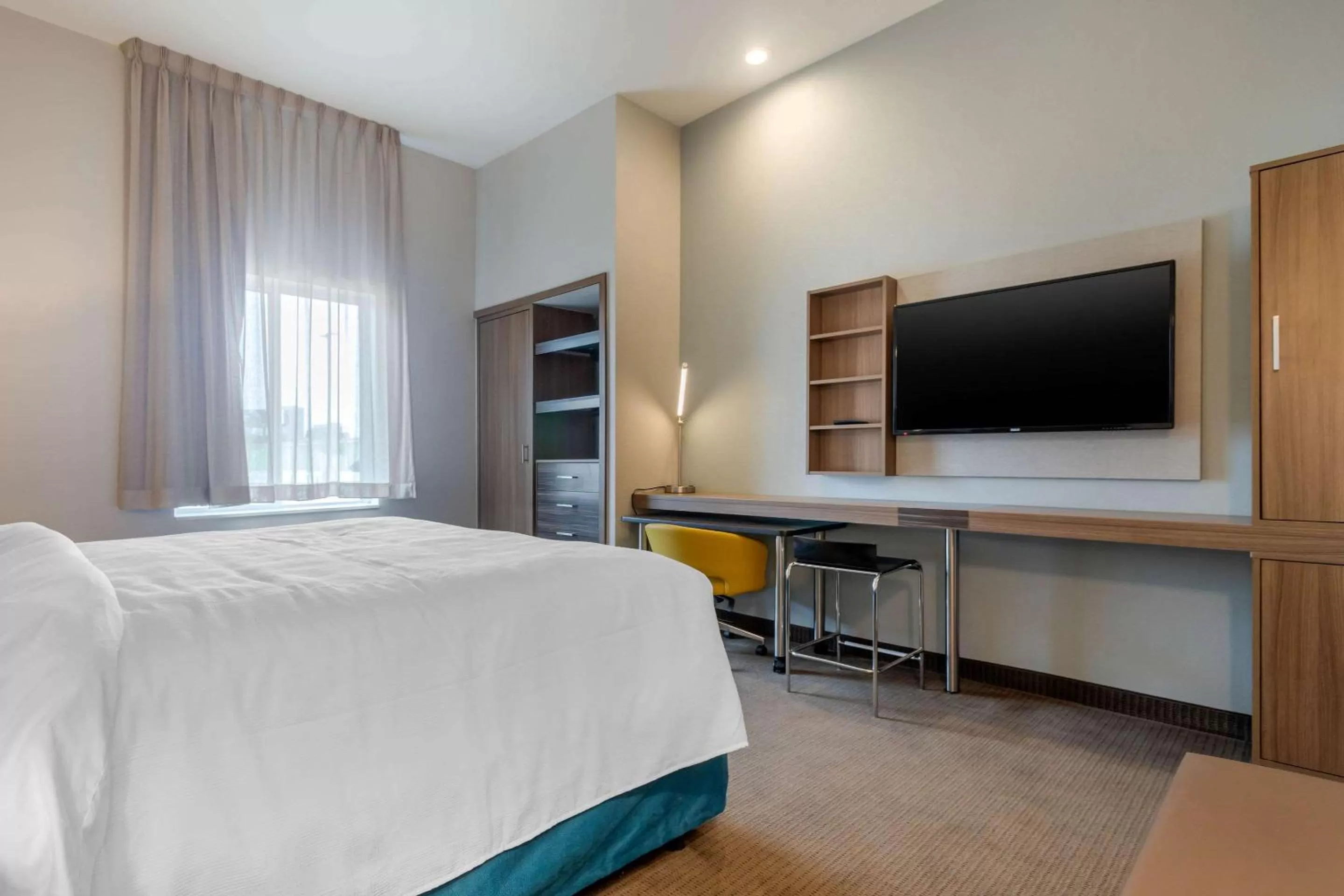 Photo of the whole room, Bed in MainStay Suites Bricktown - near Medical Center