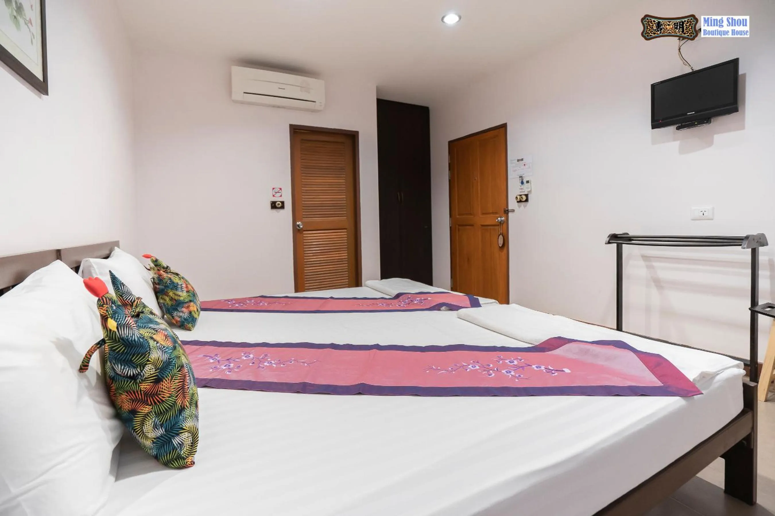 Bed in Ming Shou Boutique House