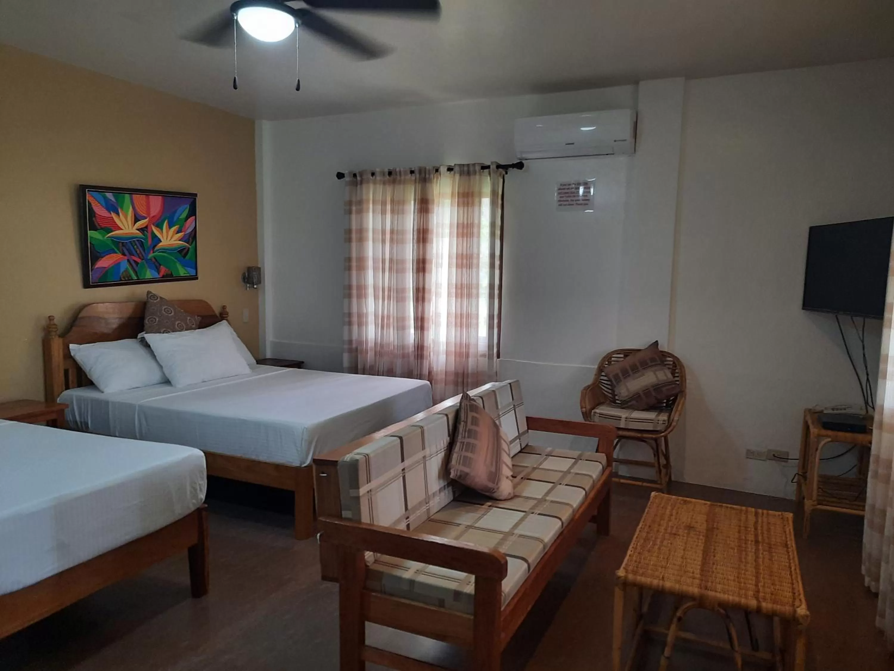 Photo of the whole room, Bed in Eastwind Beach Club- El Nido