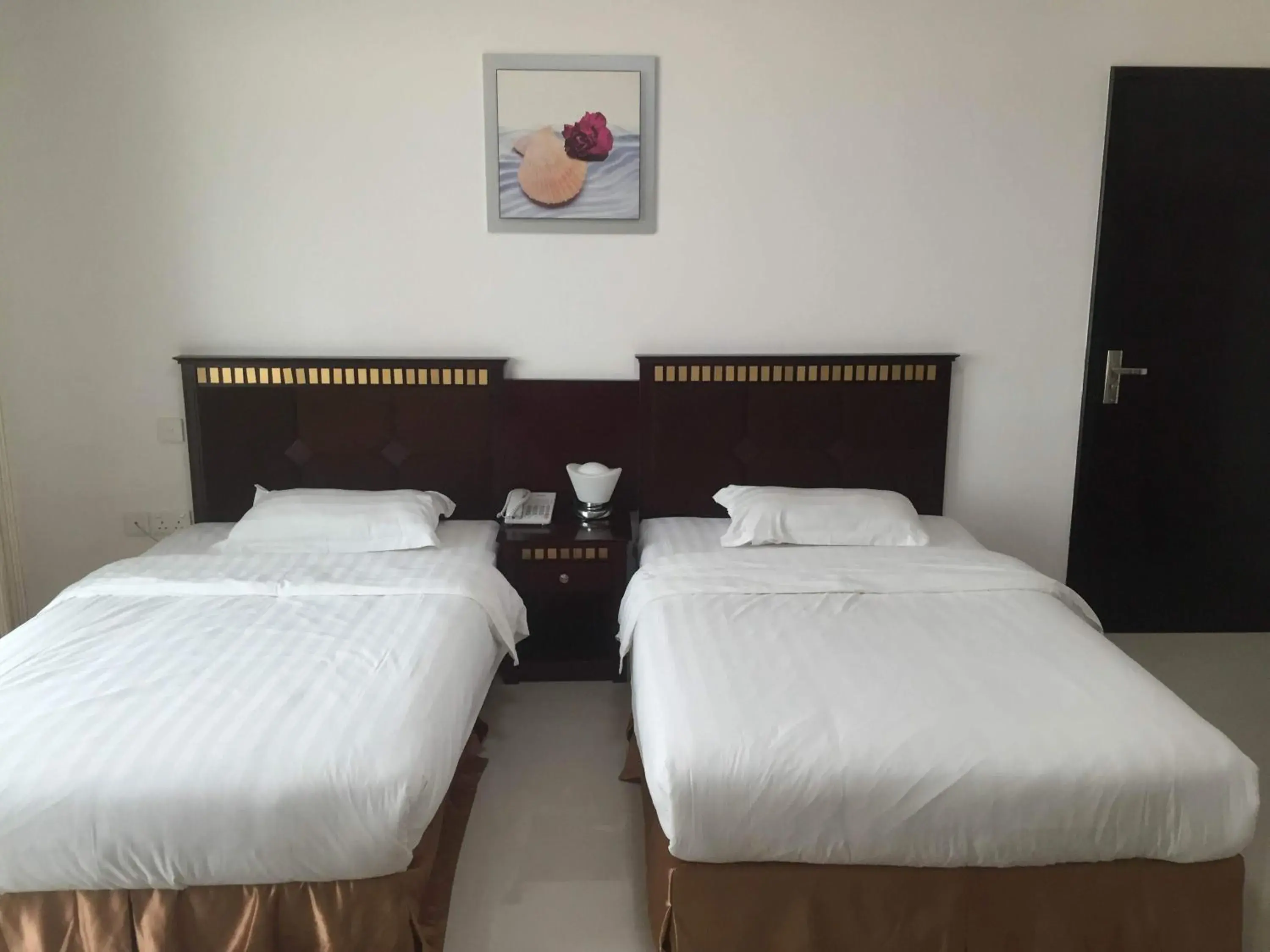 Standard Twin Bed in Salalah Beach Resort Hotel Standard Twin Bed in Salalah Beach Resort Hotel