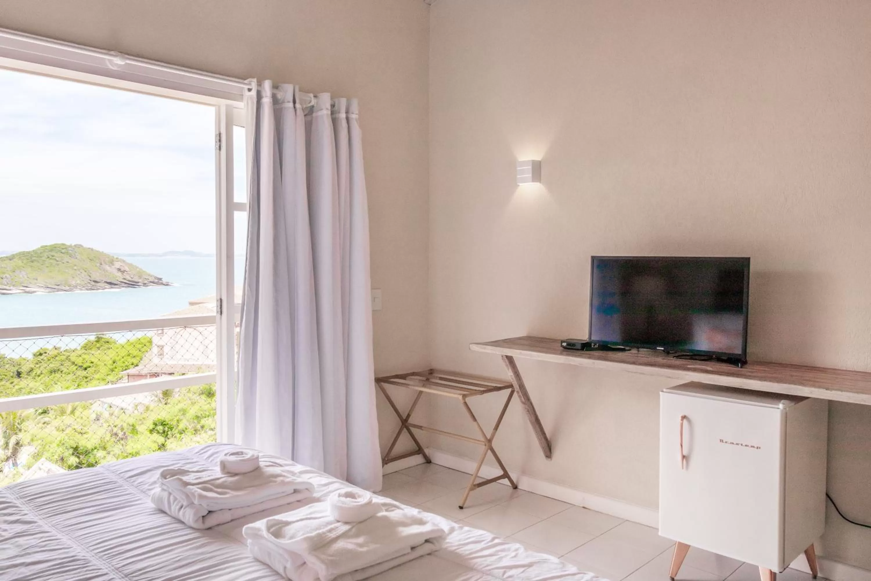 Communal lounge/ TV room, Bed in Bahiamarela Boutique Hotel & SPA