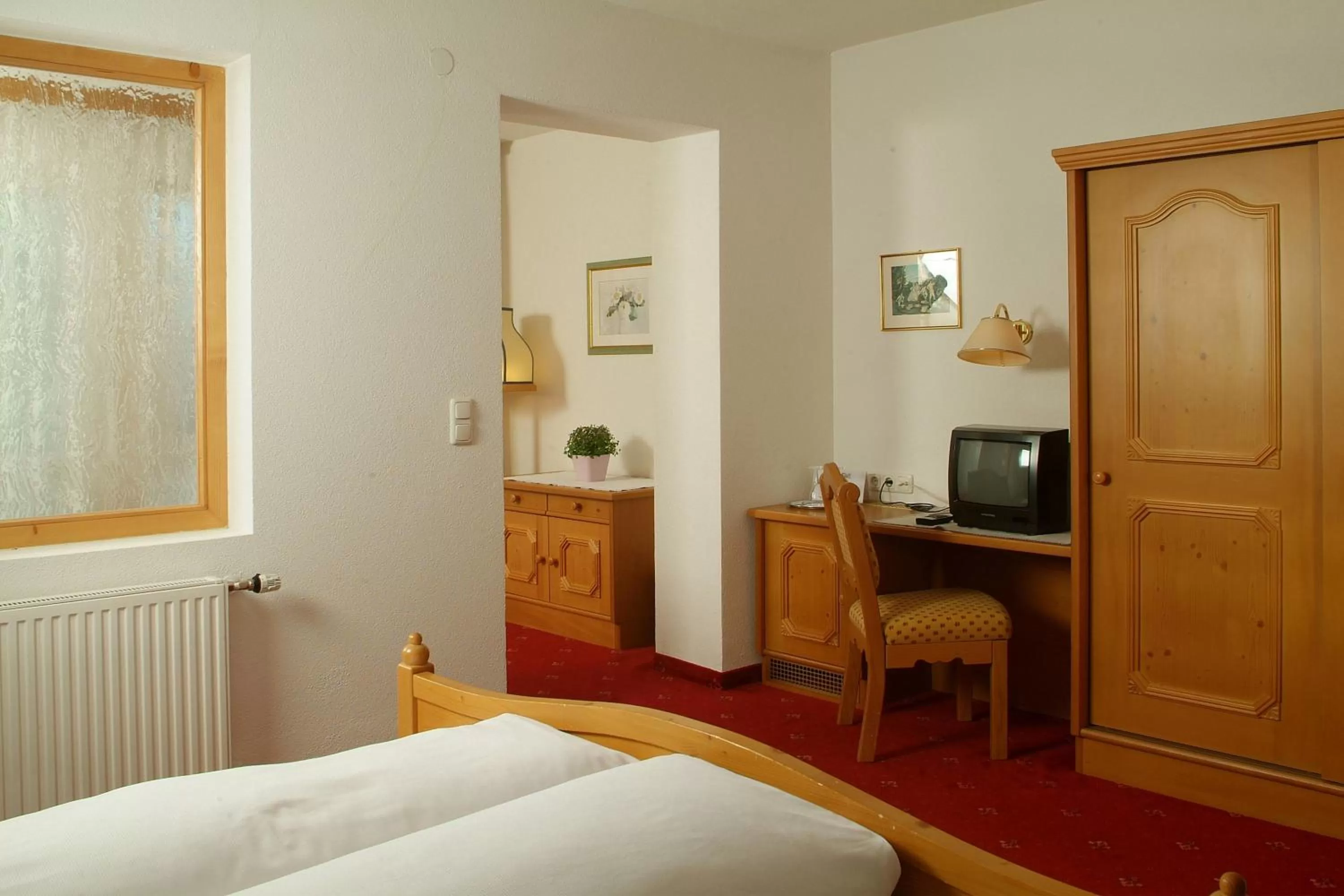 Bed in Hotel-Garni Stern - bed & breakfast & more