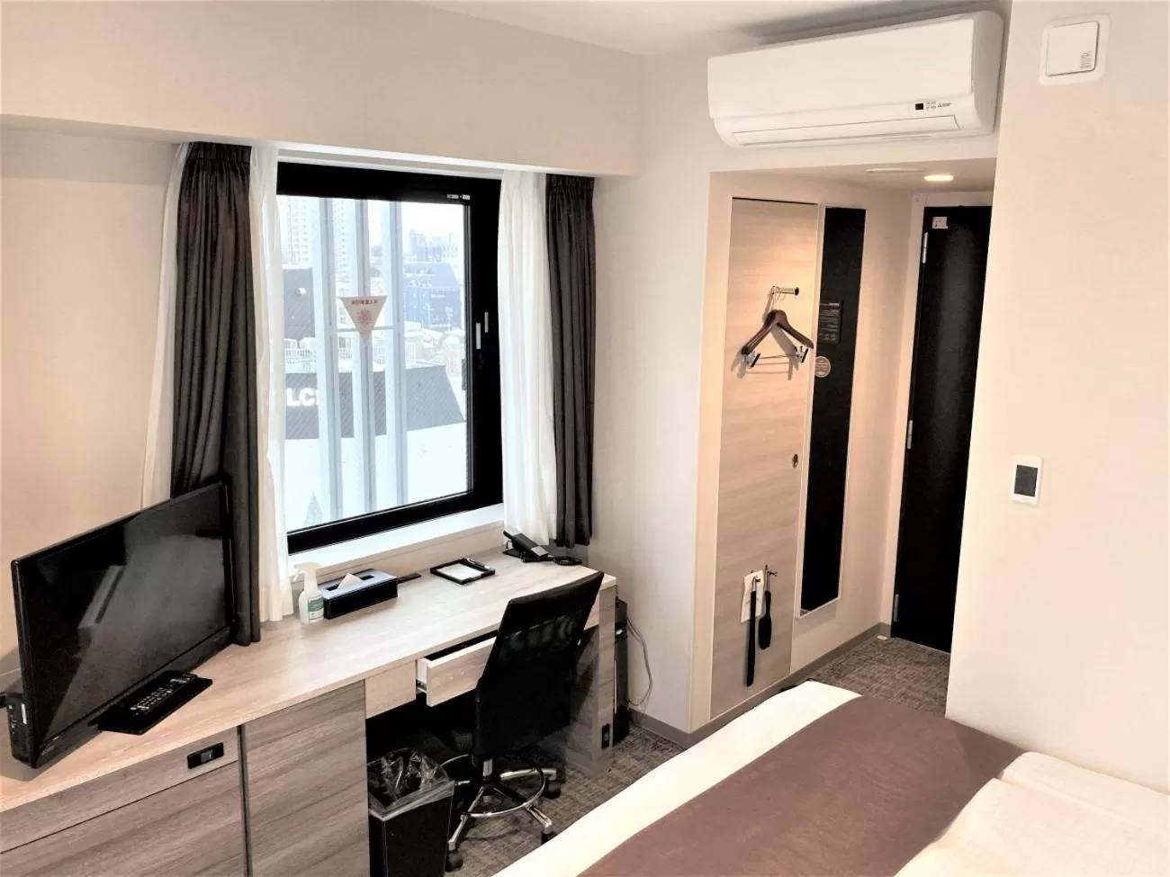 Bed in Smile Hotel Premium Hakodate Goryokaku