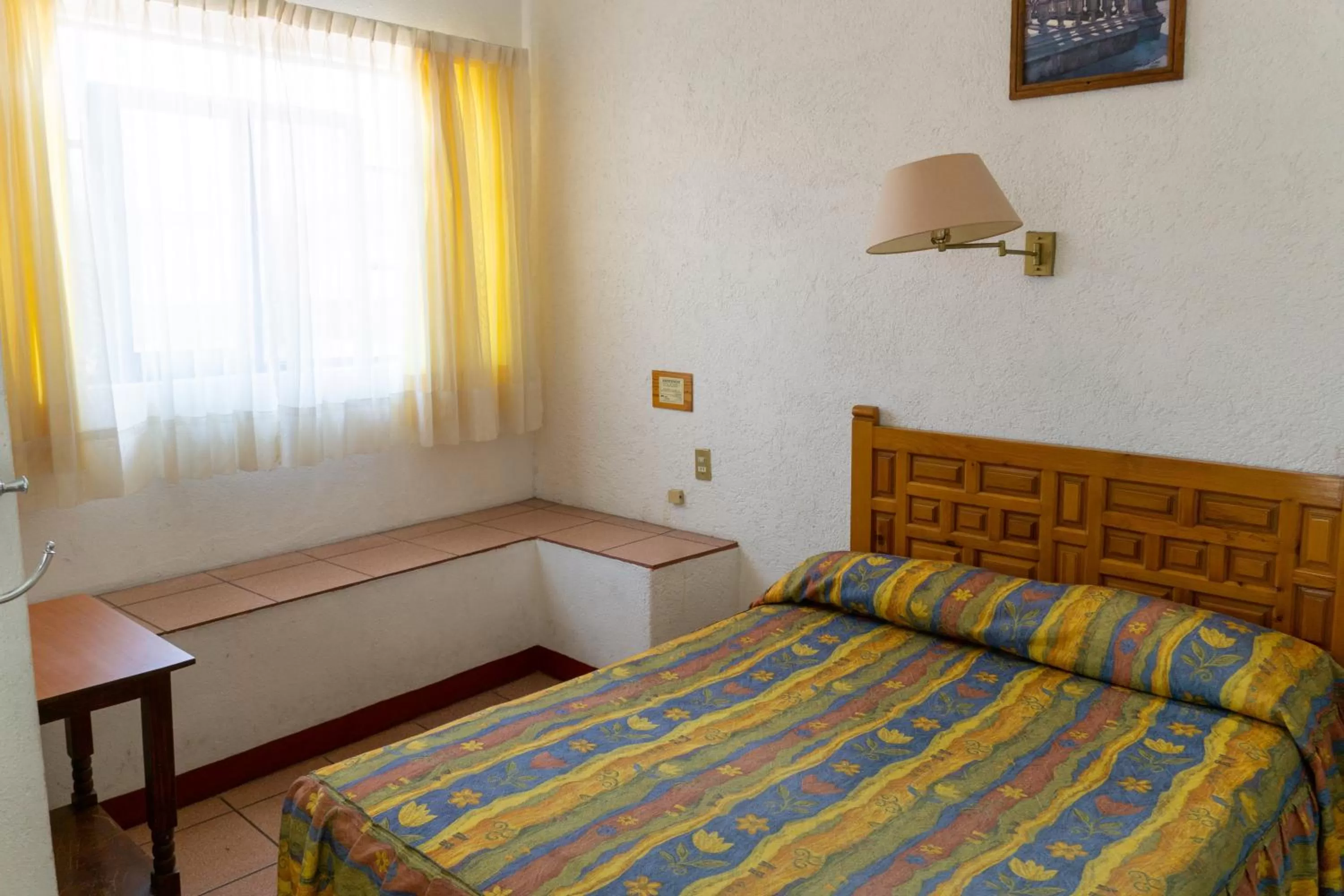 Bed in Hotel Colonial