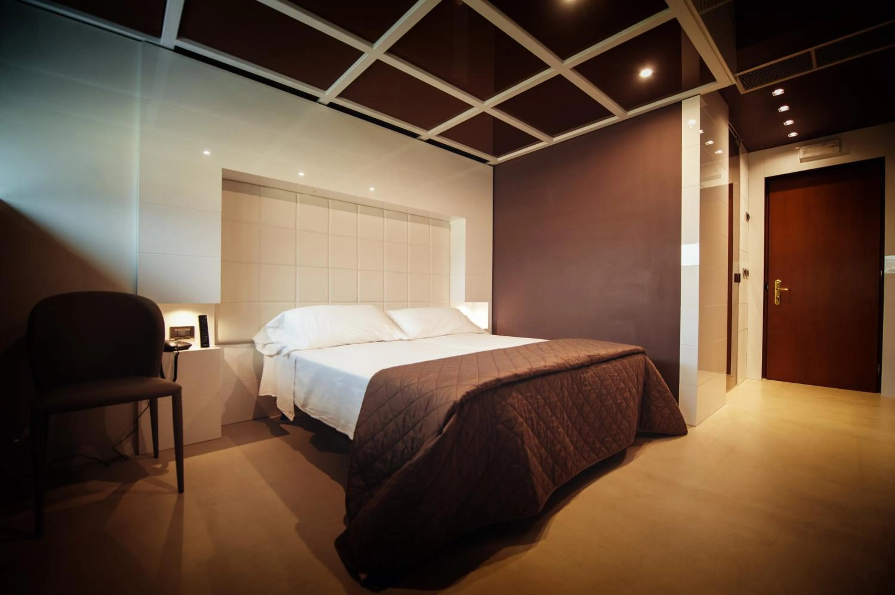 Bed in Gran Paradiso Hotel Spa