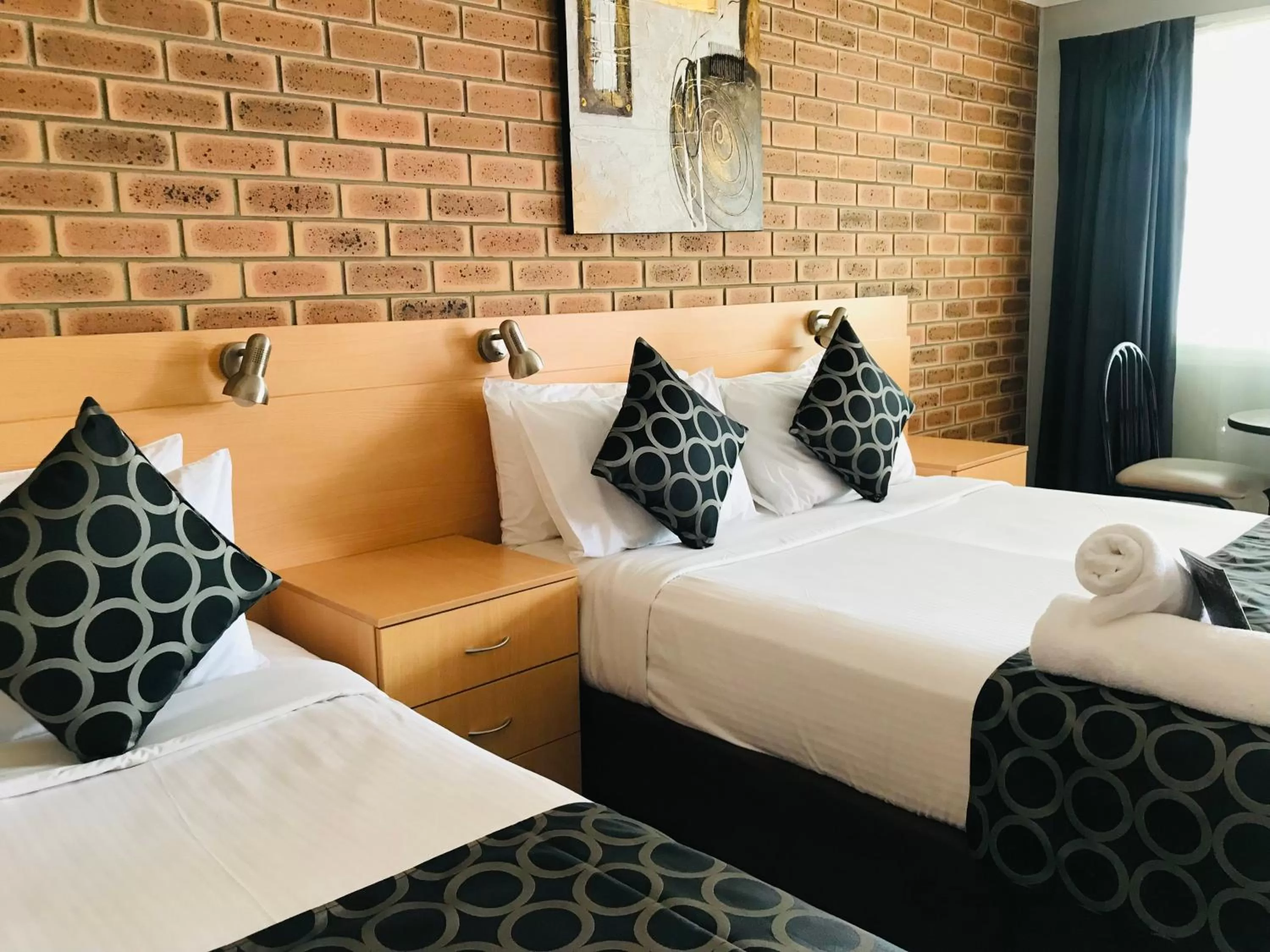 Bed in Jumbuck Motor Inn