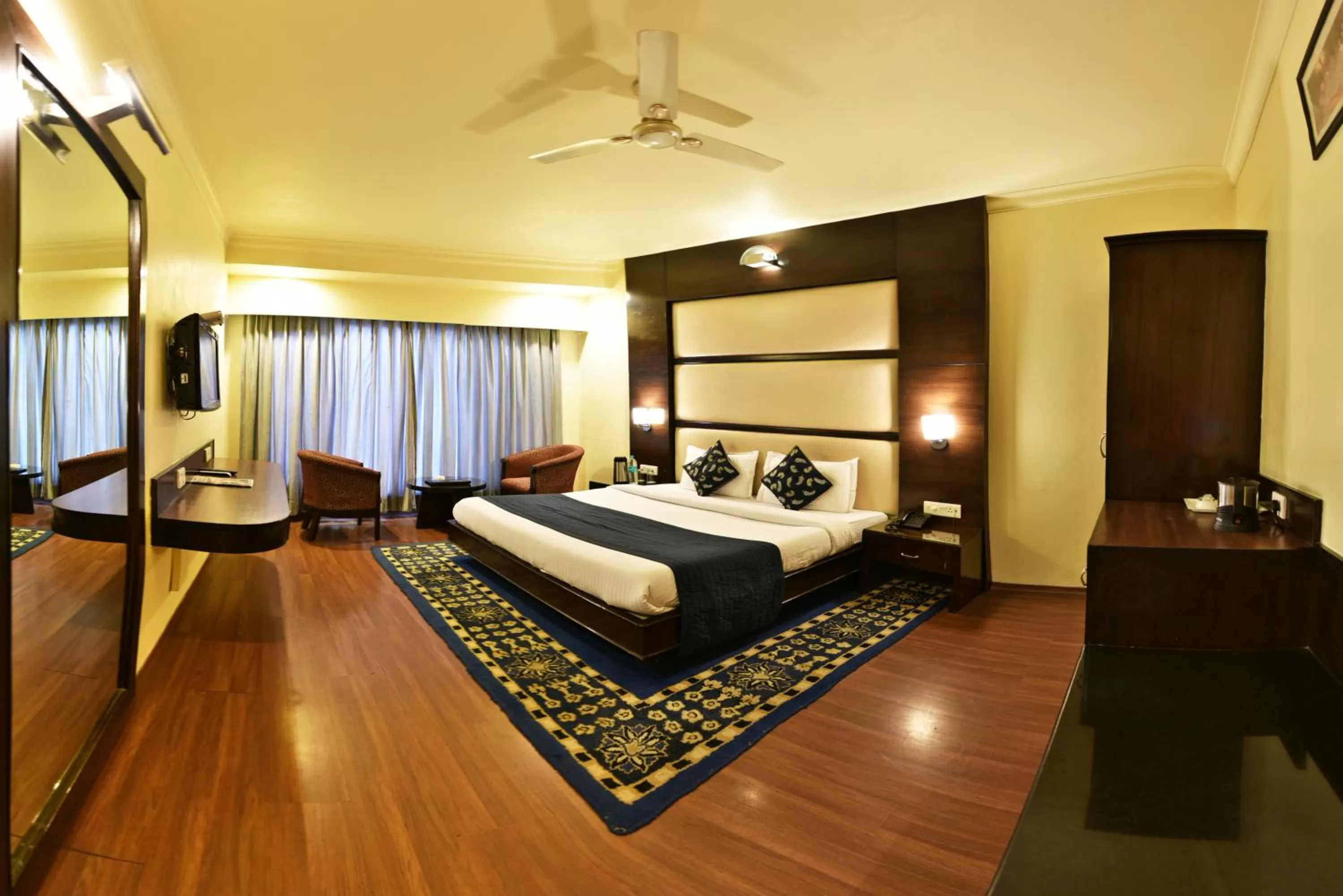 Bedroom, Bed in Indraprastha Resort - Centrally Heated Rooms, with Gym, Games & Spa