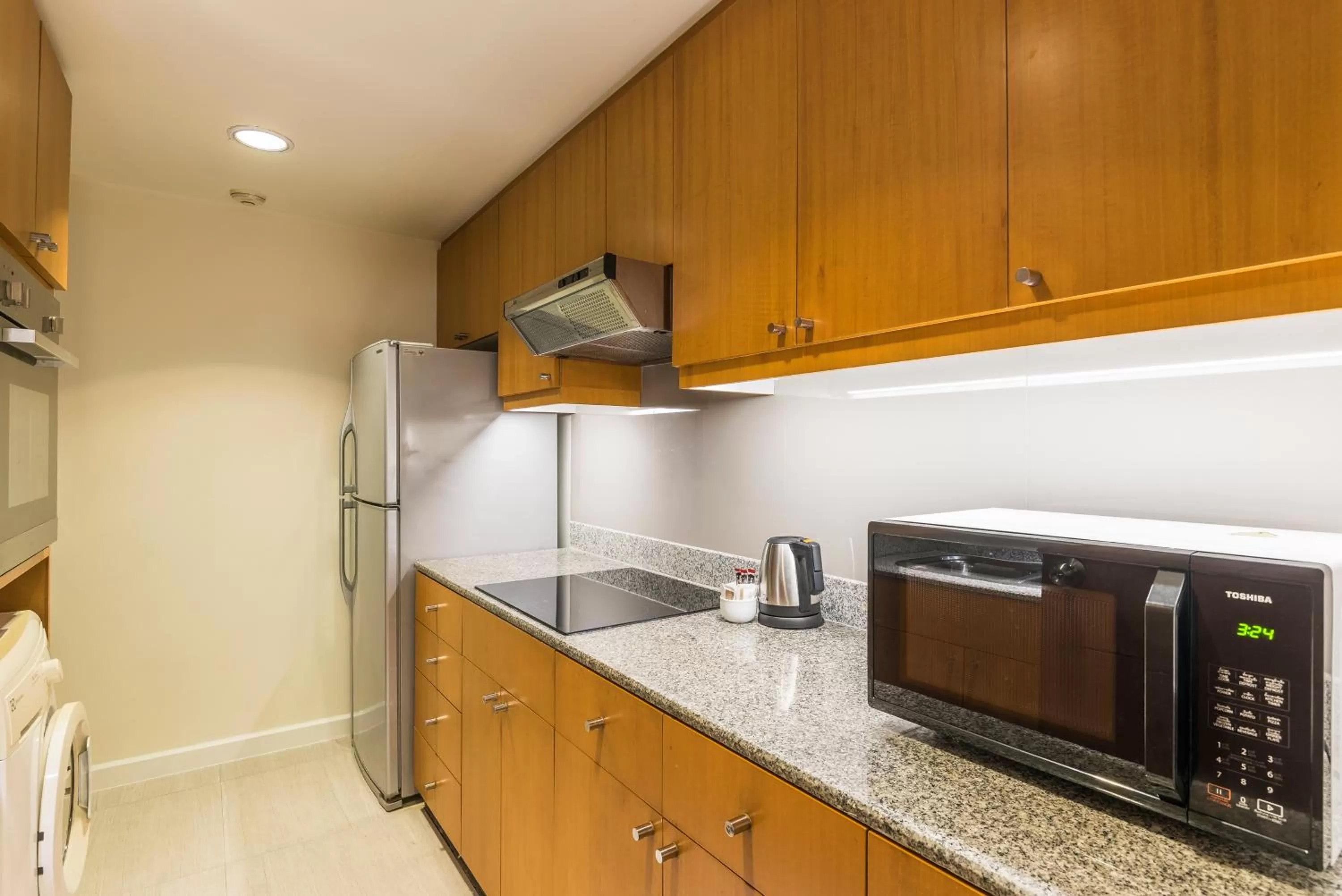 Kitchen or kitchenette in Chatrium Sathon Bangkok