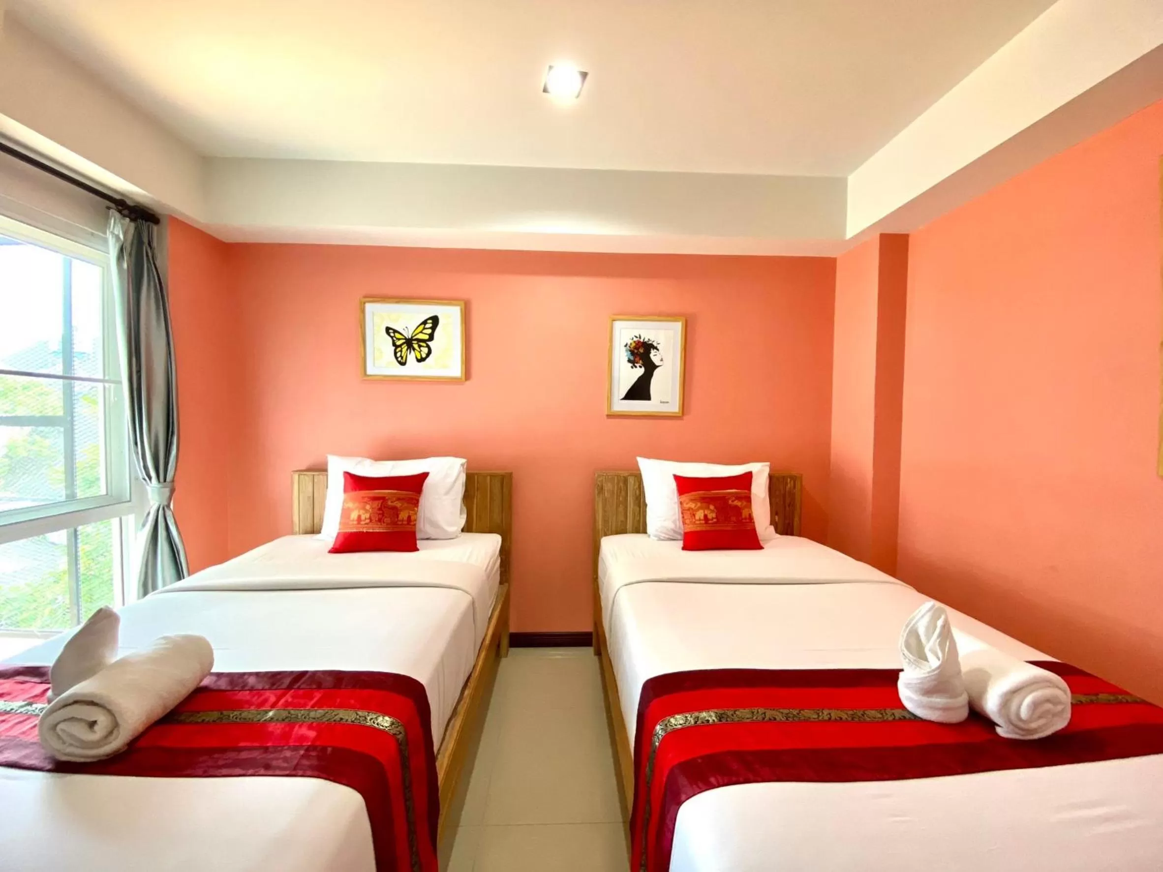 Bed in Chinda Boutique Hotel