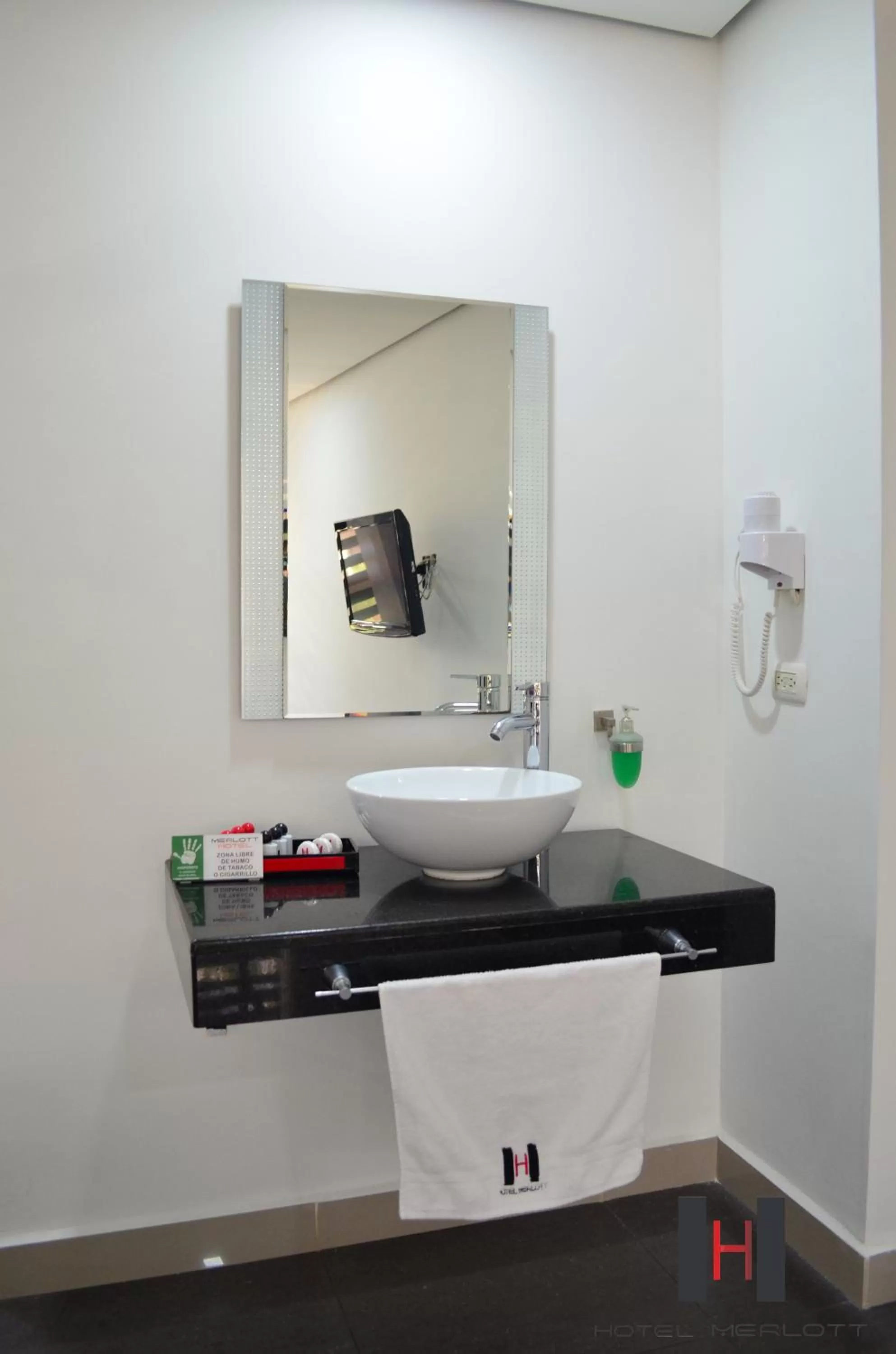 Bathroom in Hotel Merlott 70