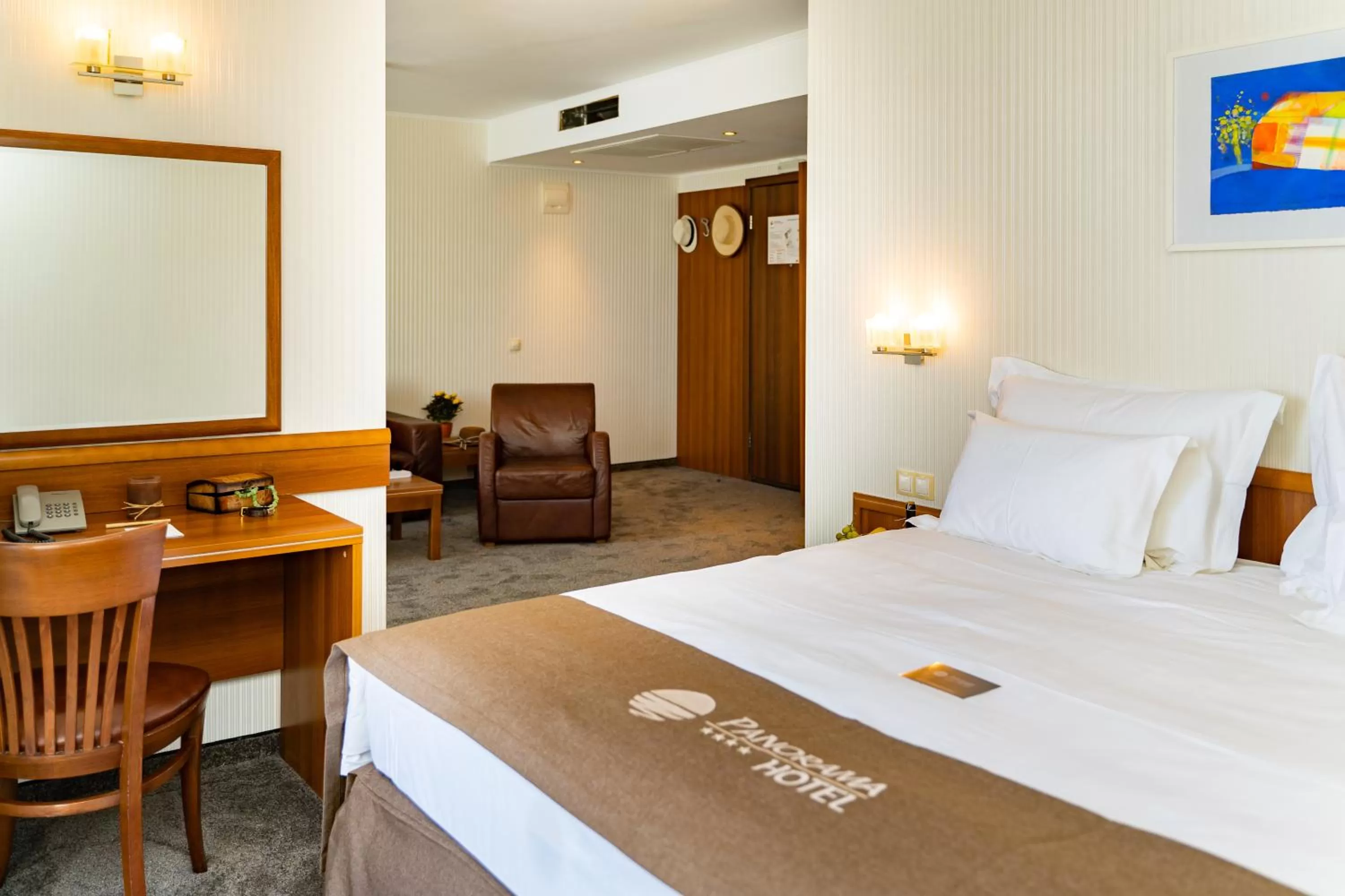 Bed in Panorama Hotel - Free EV Charging Station