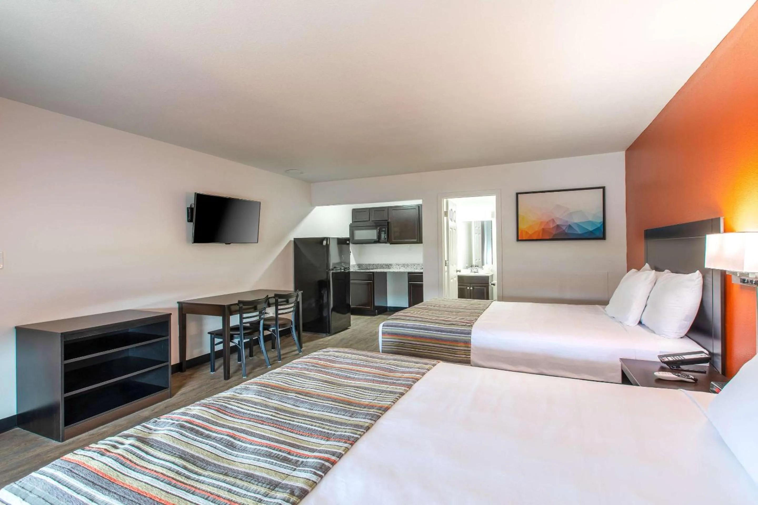 Bedroom, Bed in Suburban Studios Spartanburg - I-26