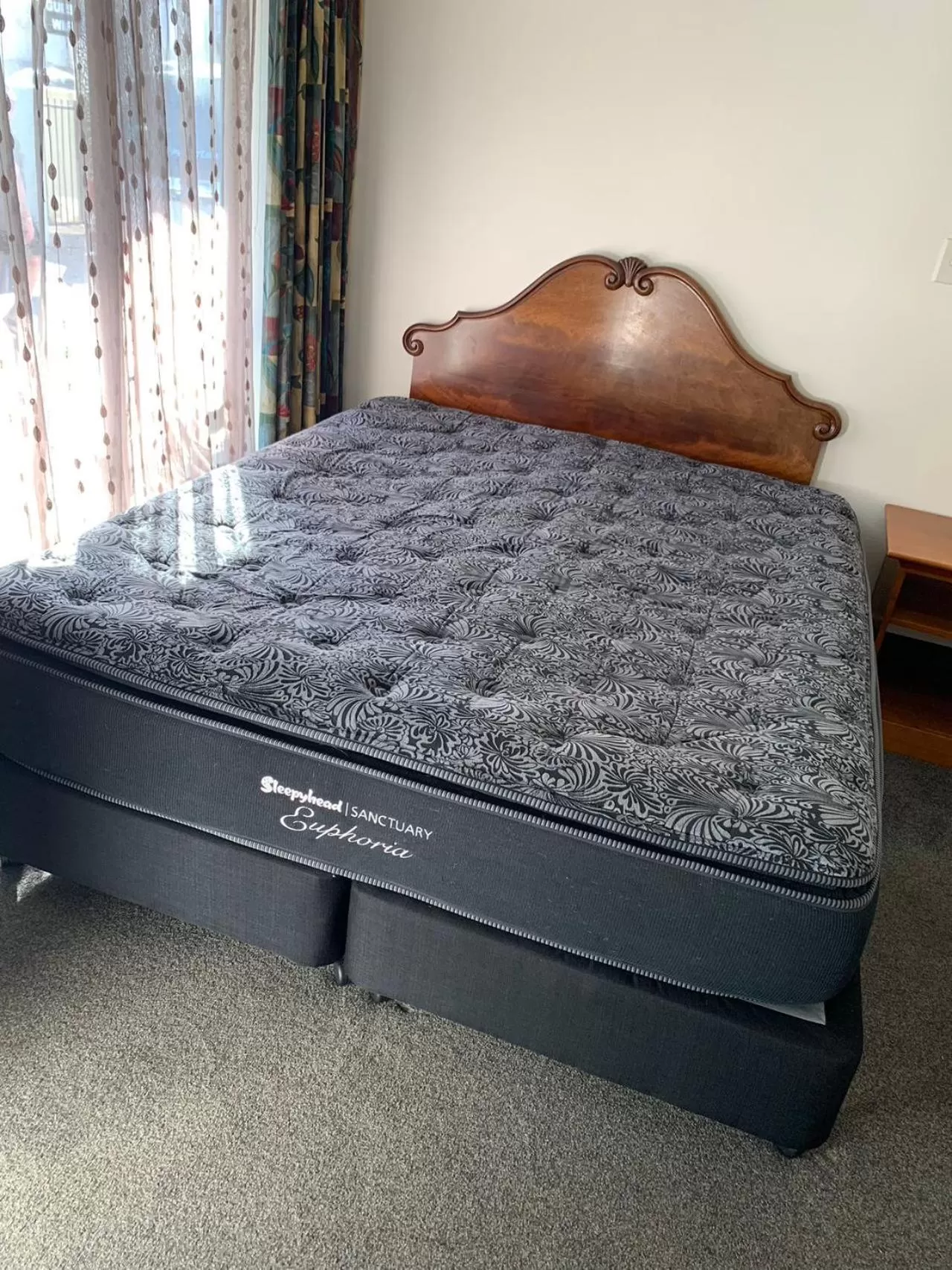 Bed in 755 Regal Court Motel