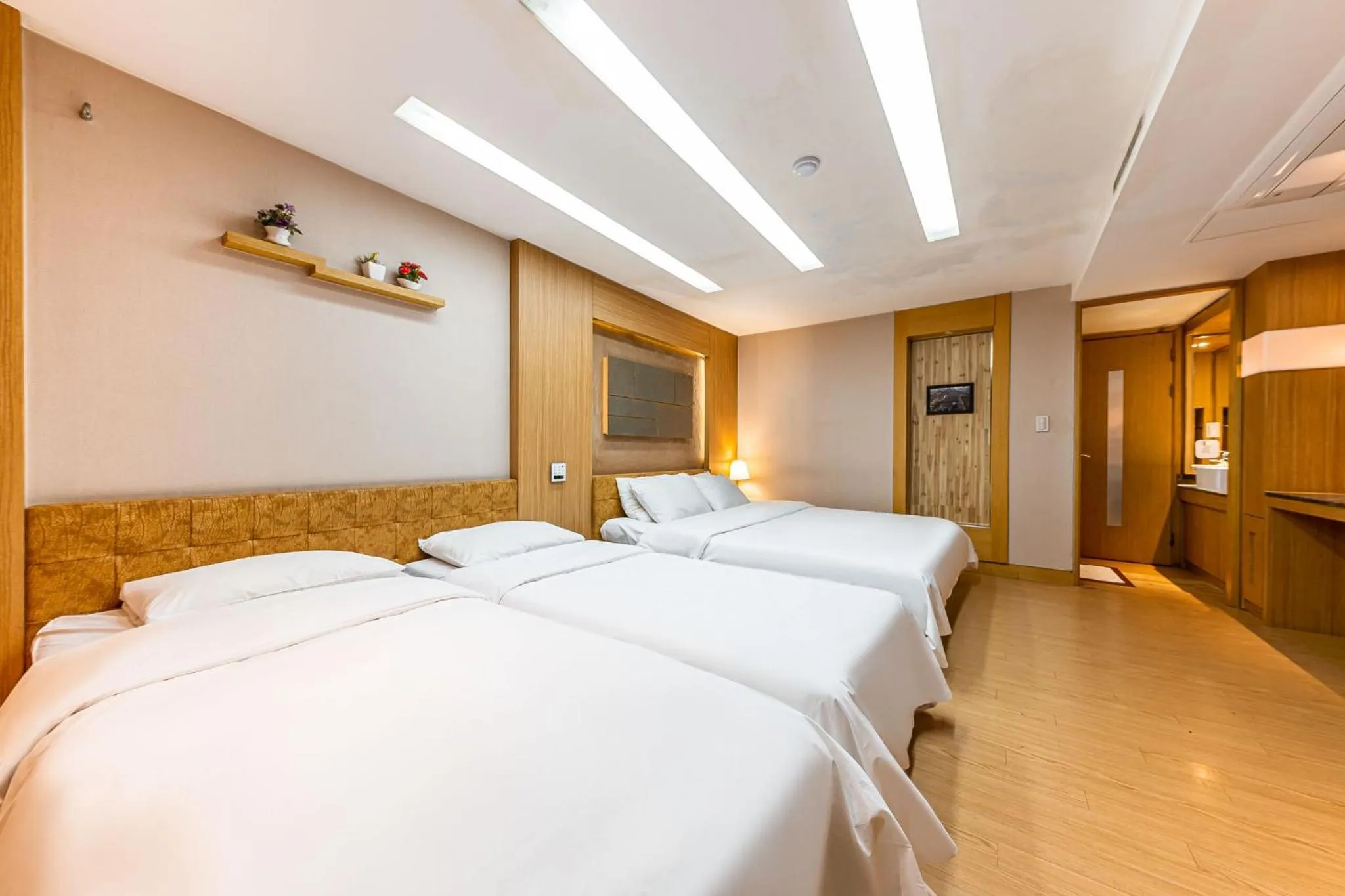 Bed in Friendly DH Naissance Hotel by Mindrum Group