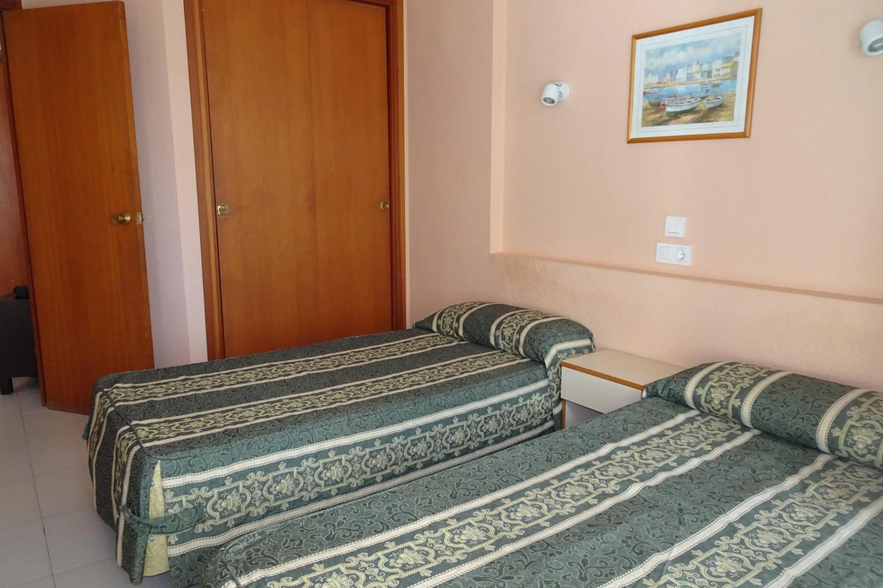 Bed in Luxmar Apartaments