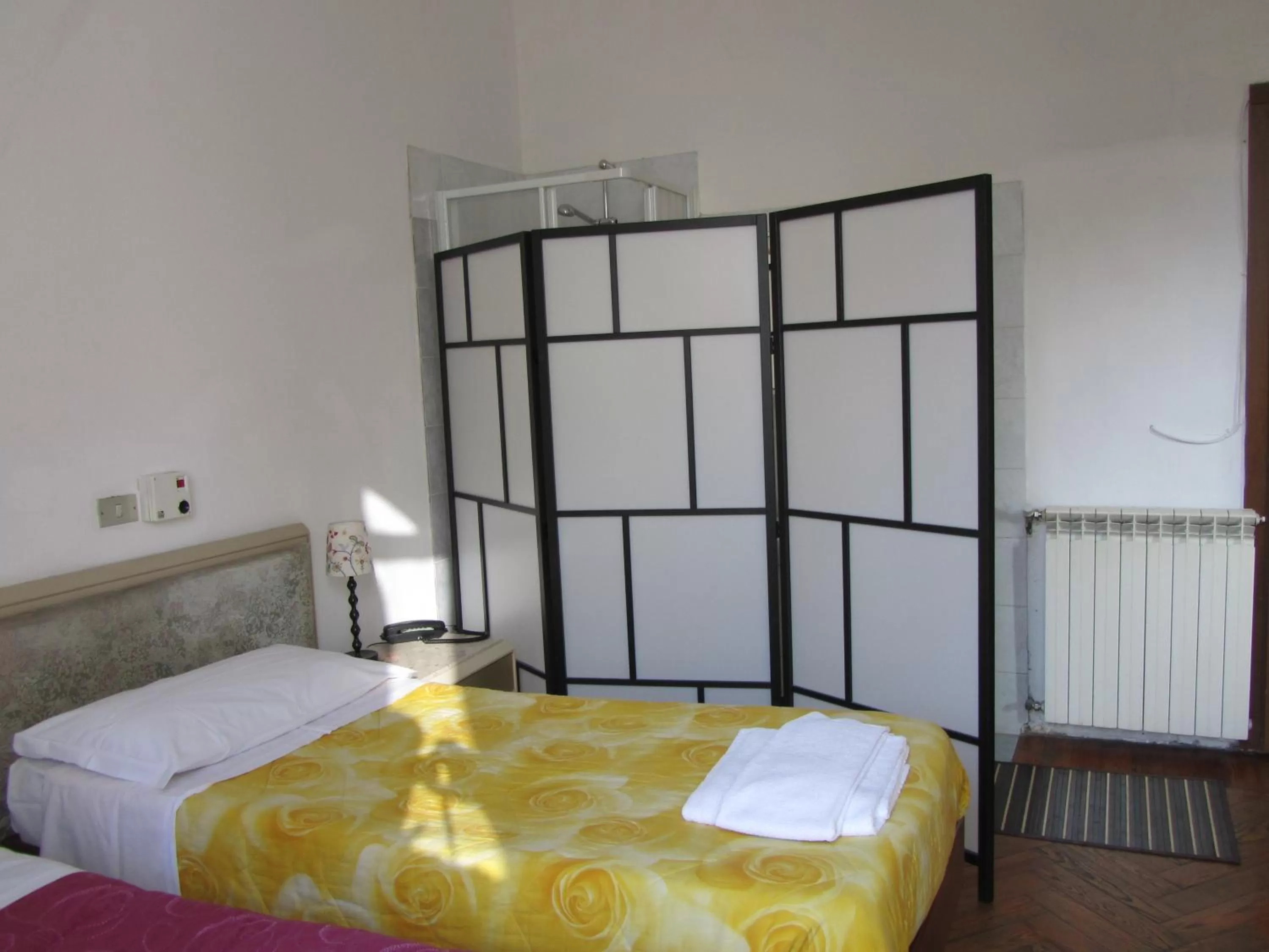 Bed in Hotel Gambara