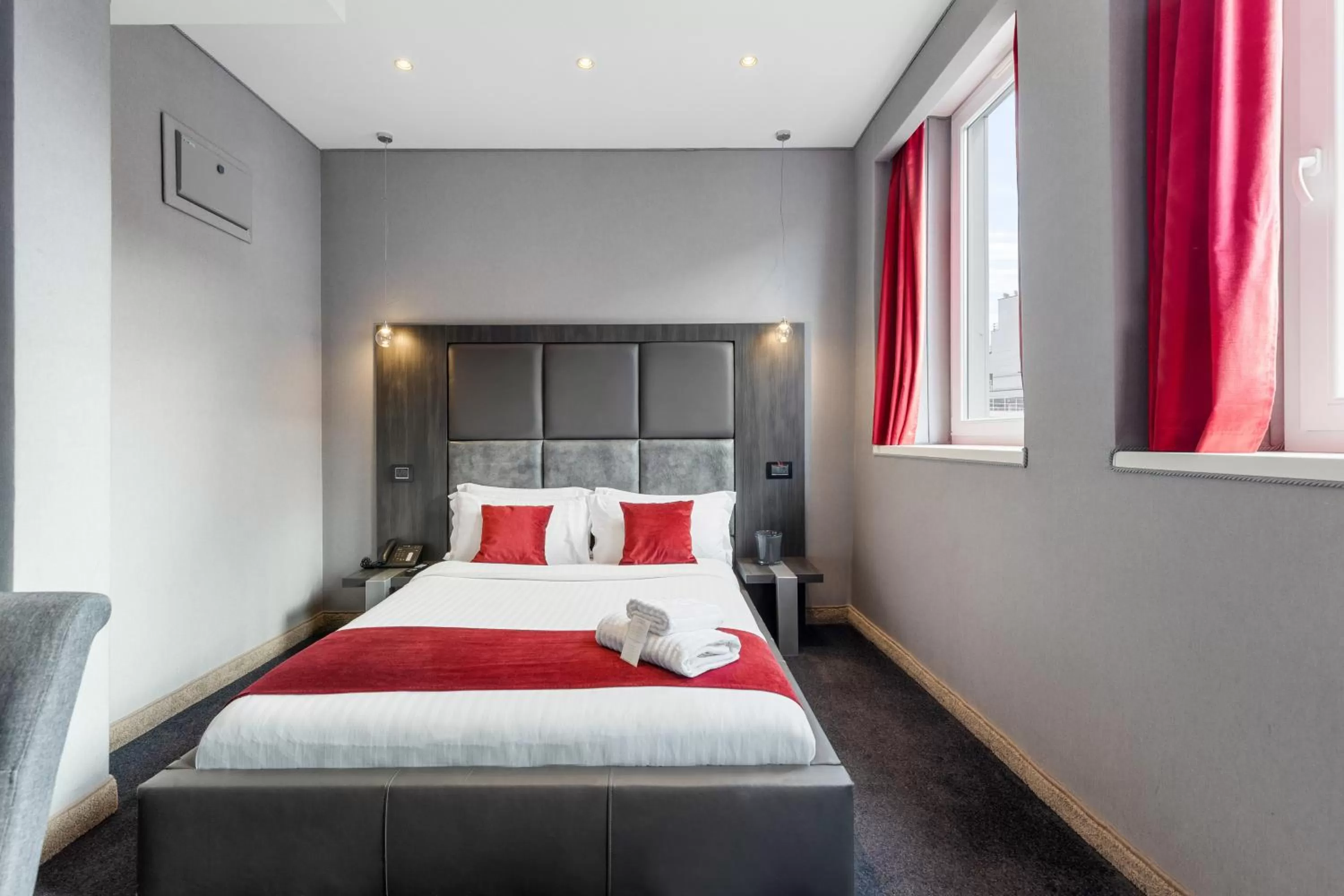 Bed in The Bryson Hotel