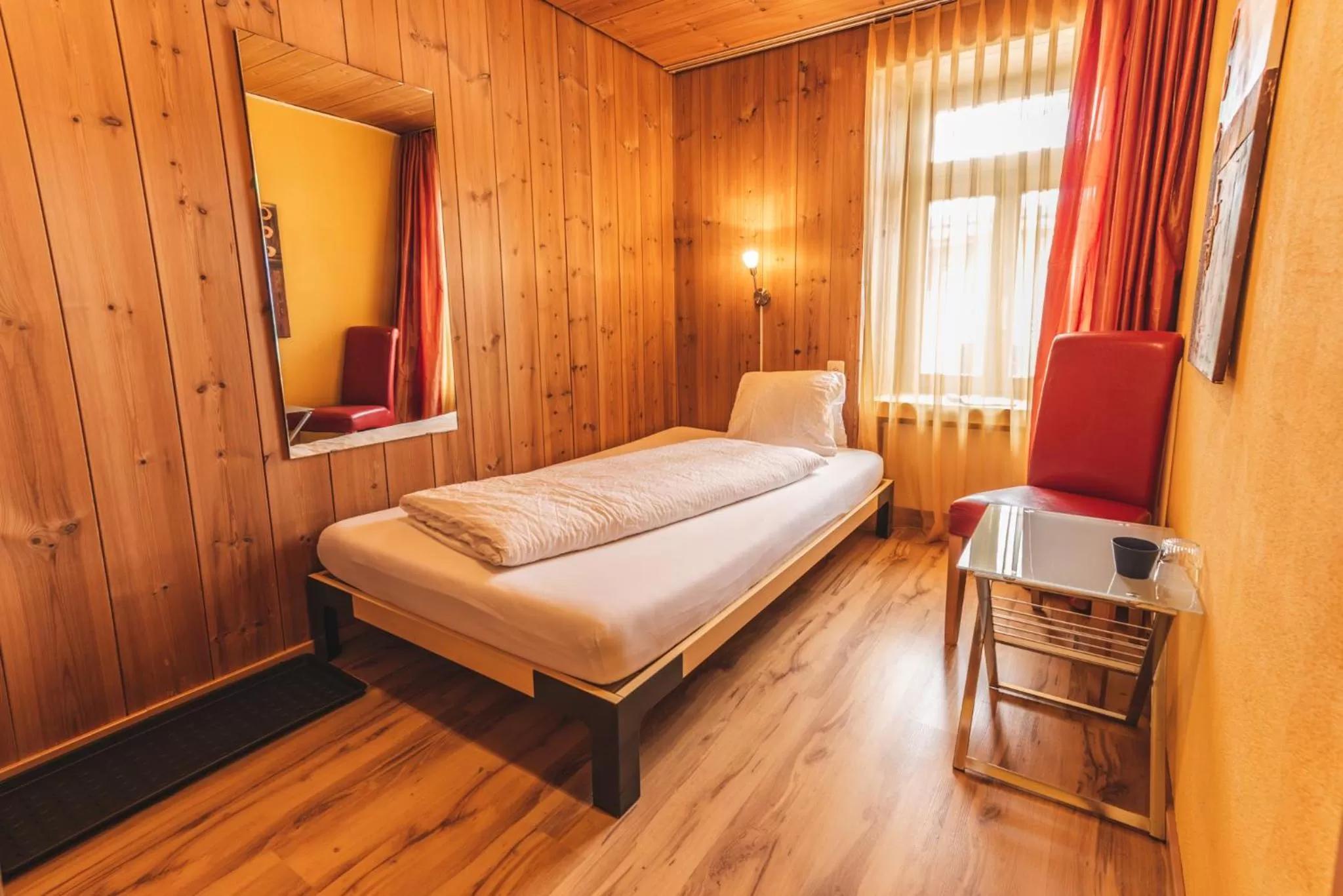 Photo of the whole room, Bed in CURUNA Hotel-Garni