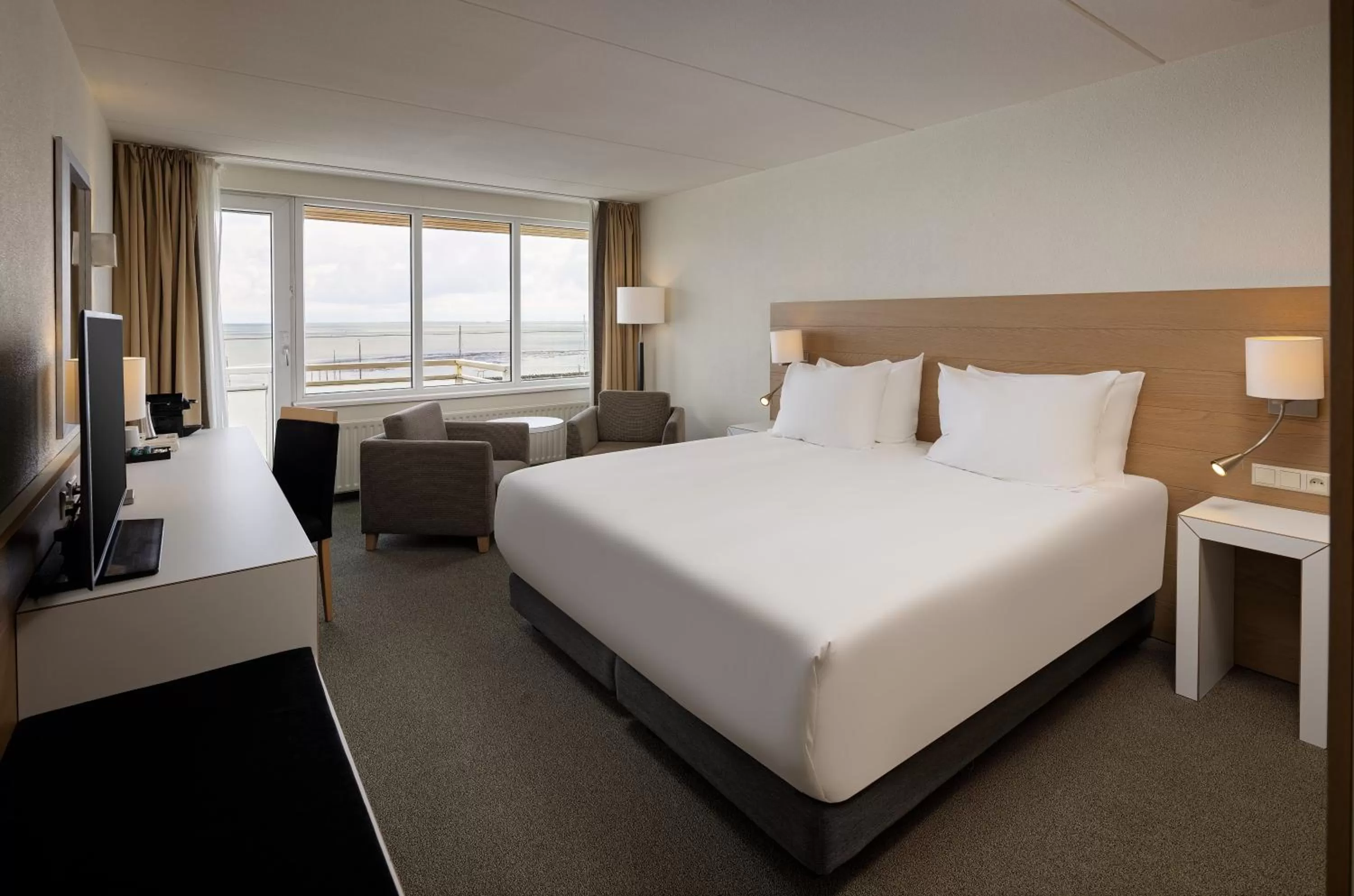 Photo of the whole room, Bed in WestCord Hotel Schylge