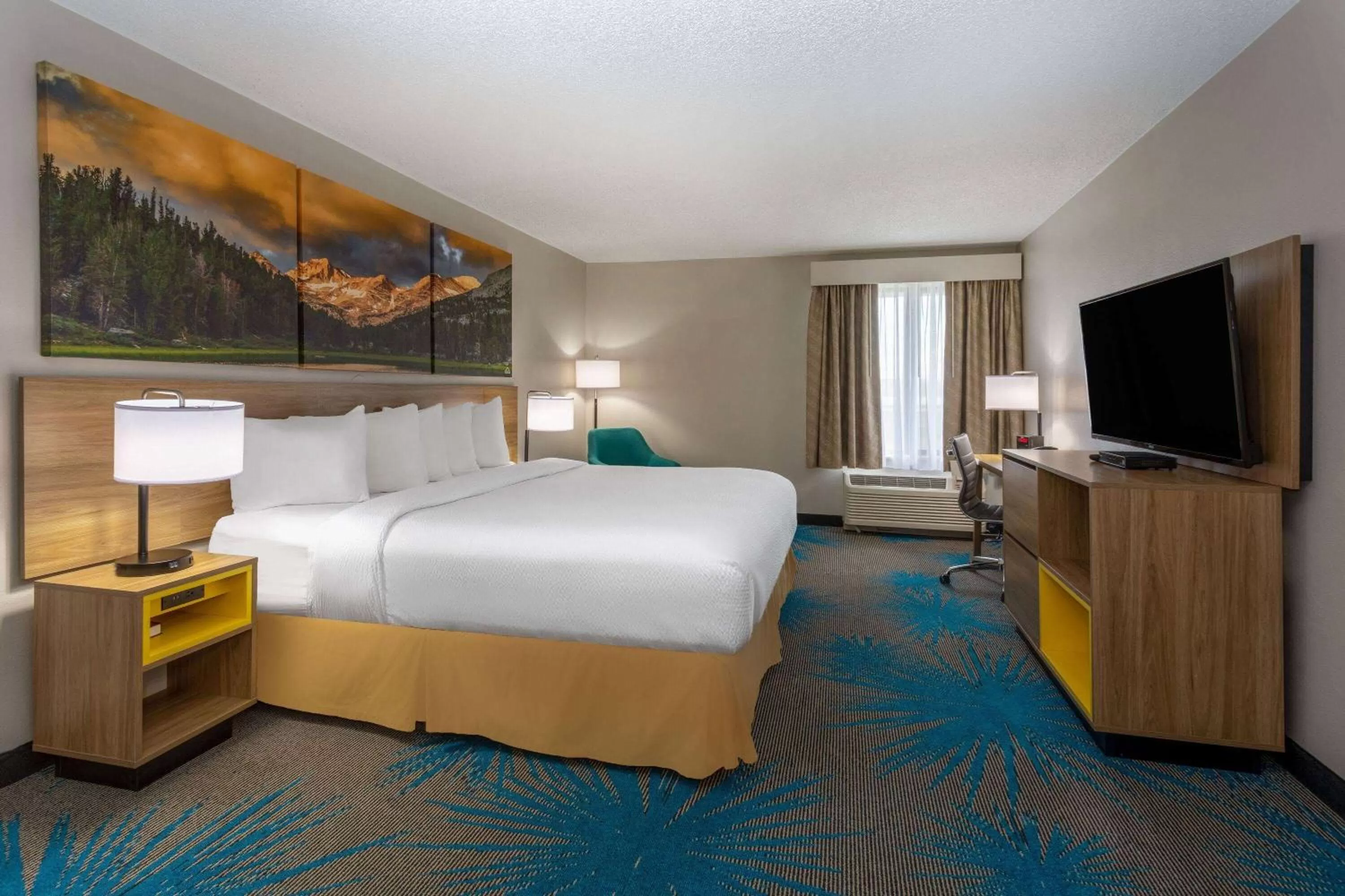 Photo of the whole room, Bed in Days Inn & Suites by Wyndham Denver International Airport