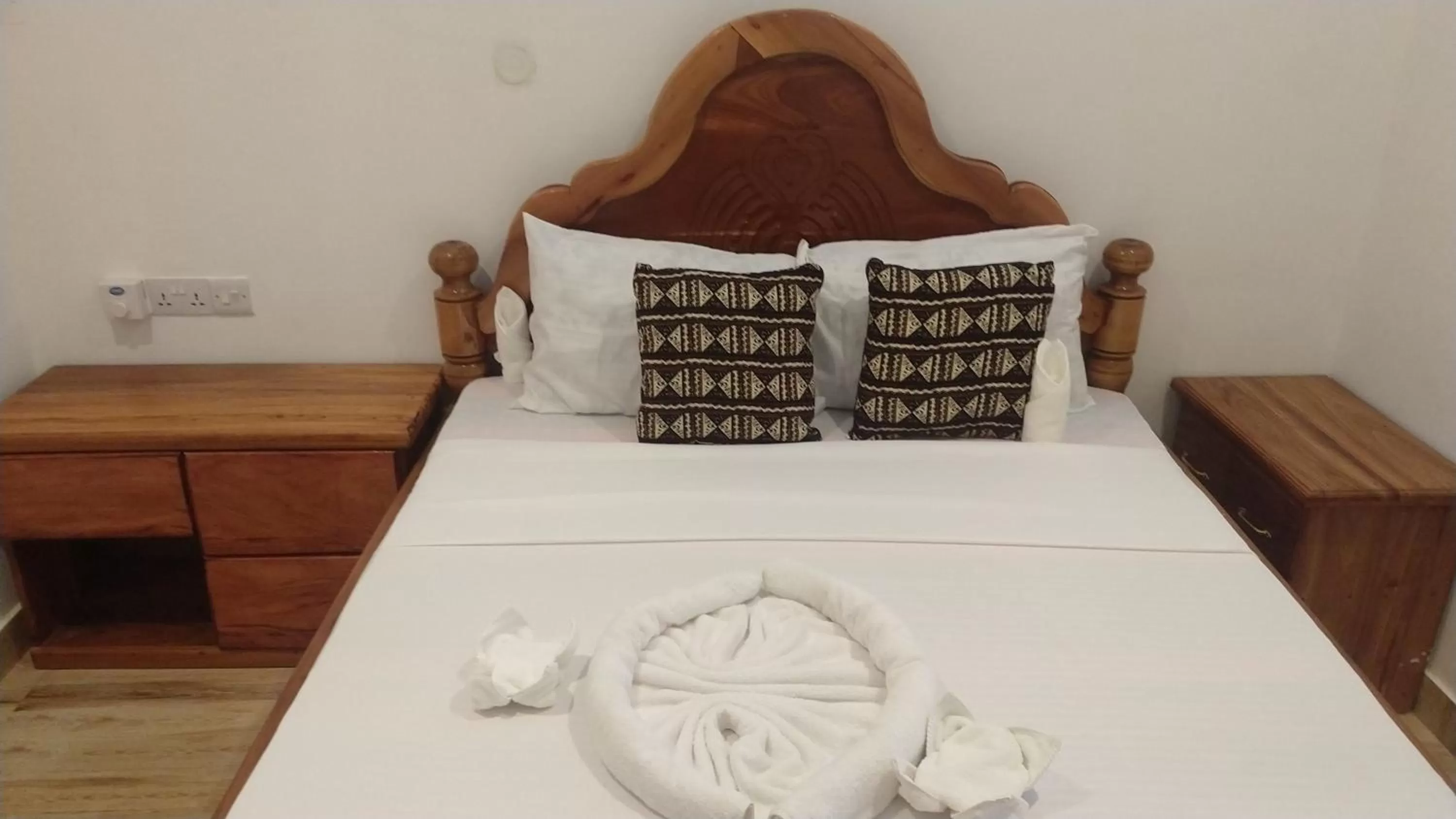 Bed in Nungwi Heritage Resort