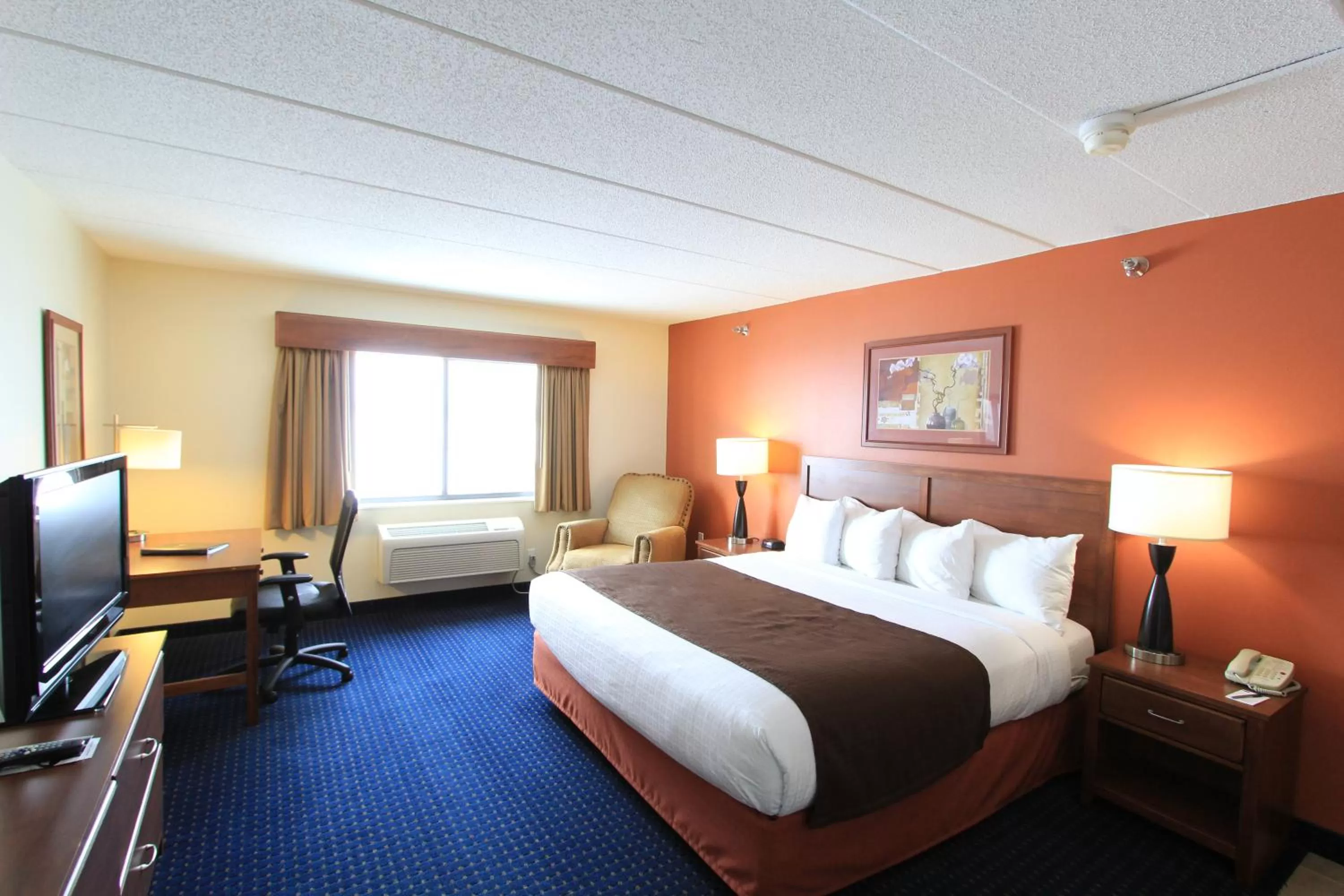 Photo of the whole room, Bed in AmericInn by Wyndham Cedar Rapids Airport